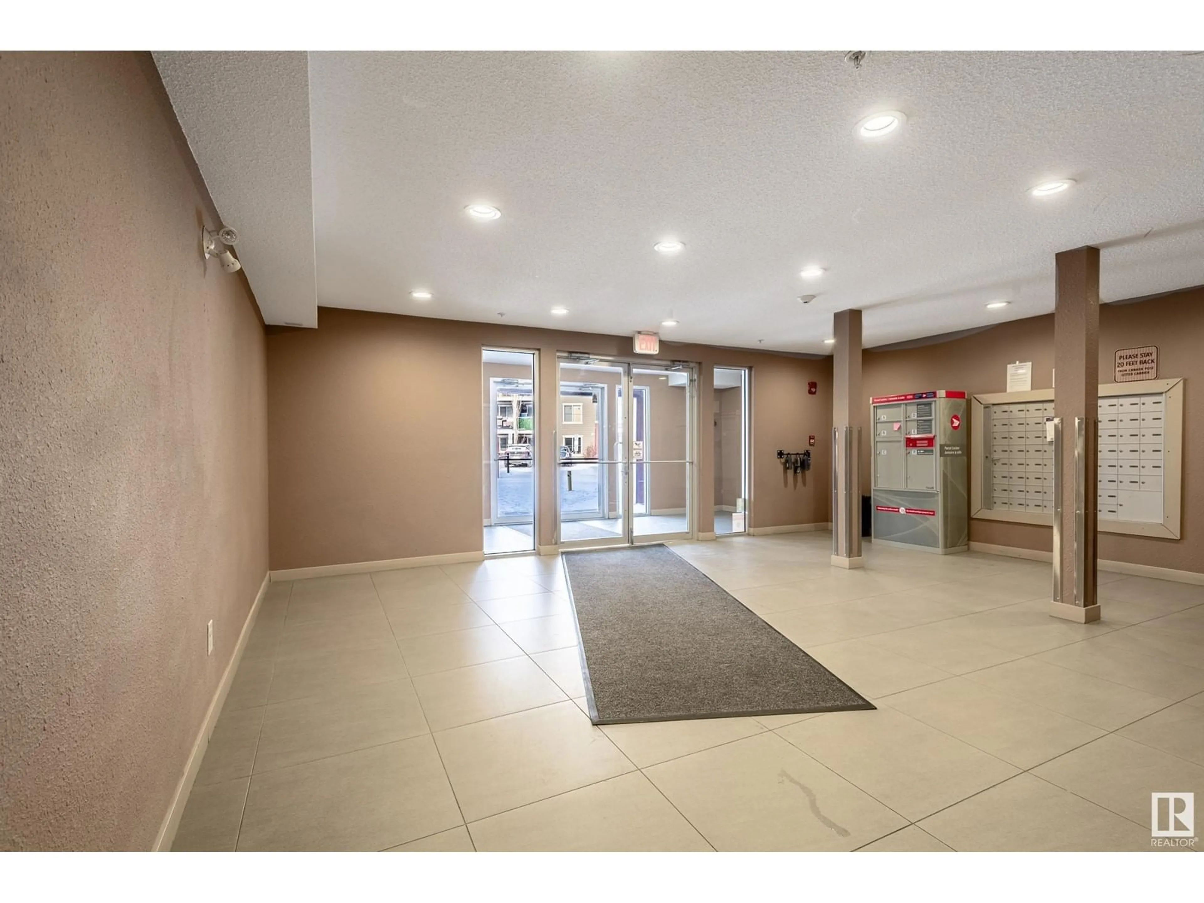 Indoor foyer for #213 1080 McConachie BV NW, Edmonton Alberta T5Y0X2