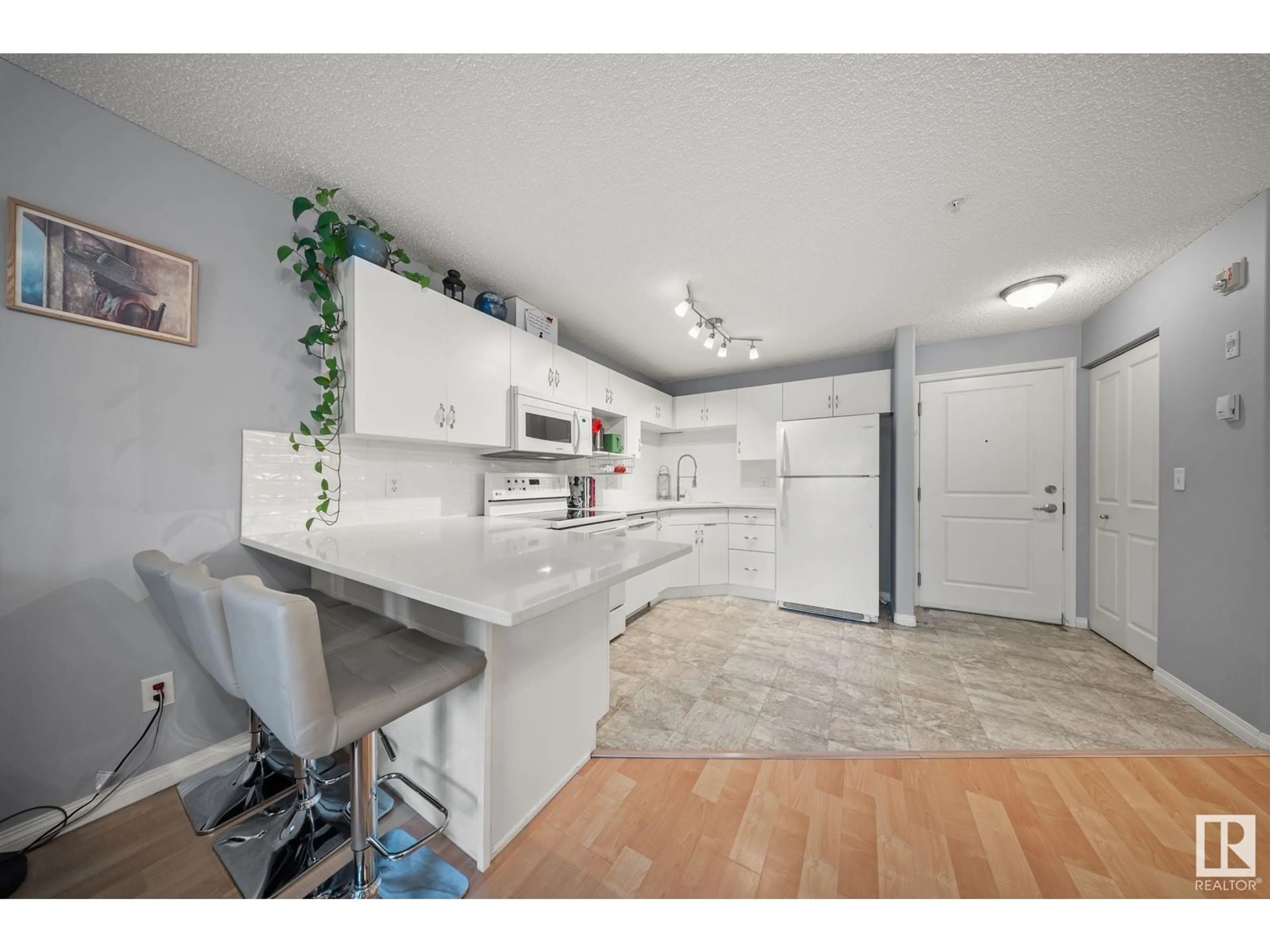 Open concept kitchen, ceramic/tile floor for #214 10535 122 ST NW, Edmonton Alberta T5N0Z9