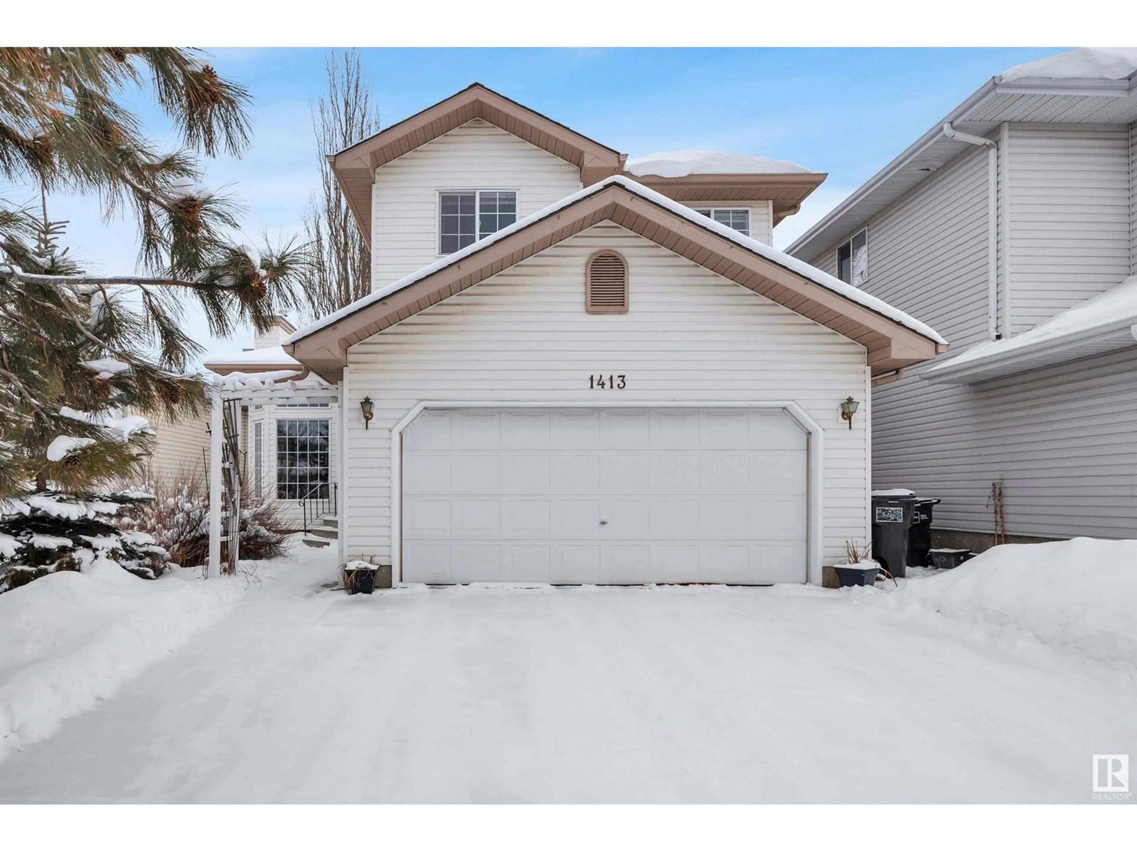 Home with vinyl exterior material, street for 1413 JEFFERYS CRES NW, Edmonton Alberta T6L6T4