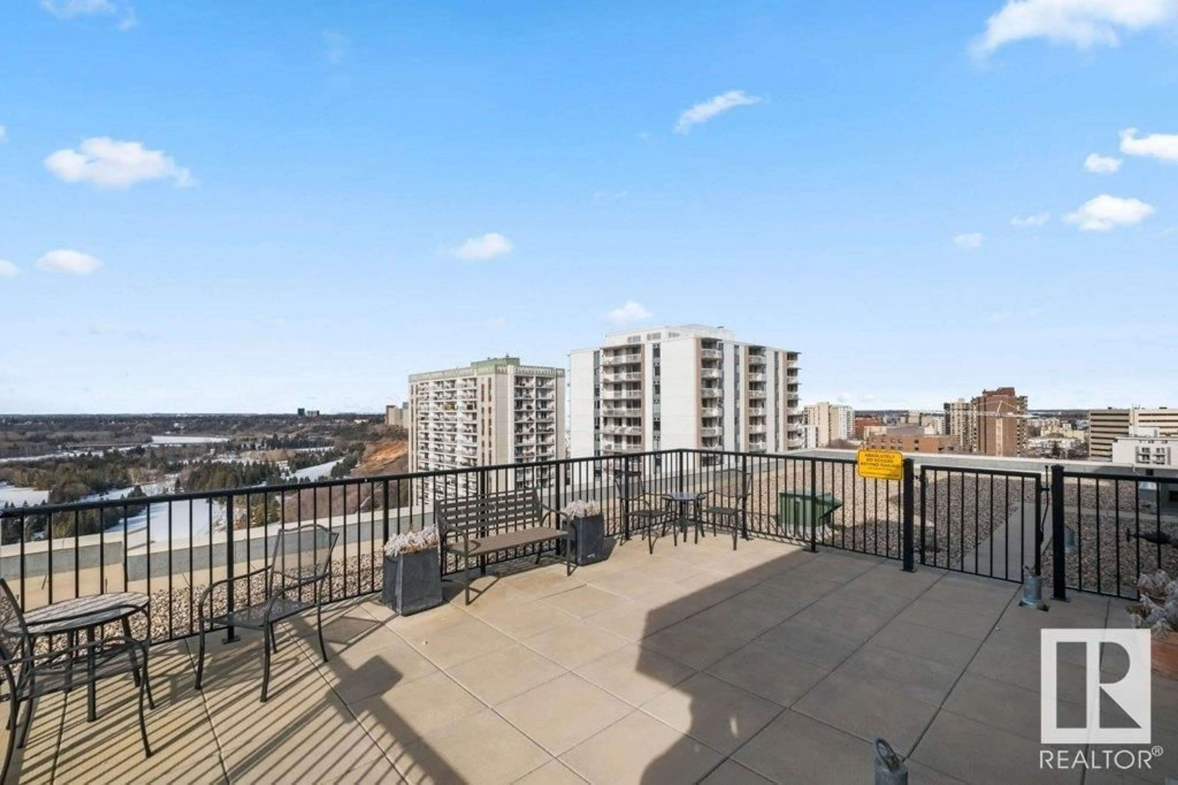 Patio, city buildings view from balcony for #306 9816 112 ST NW, Edmonton Alberta T5K1L5