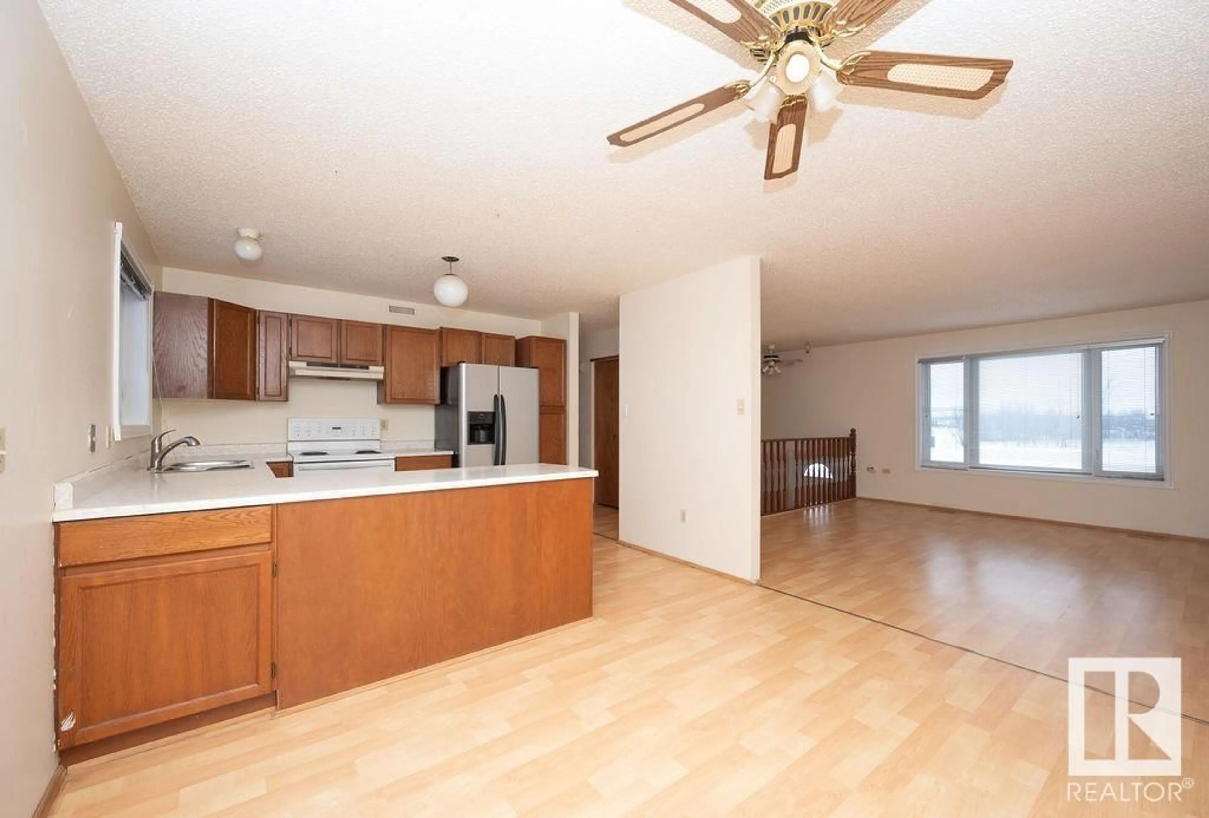 Open concept kitchen, wood/laminate floor for 3203 45 AV, Athabasca Town Alberta T9S1P1