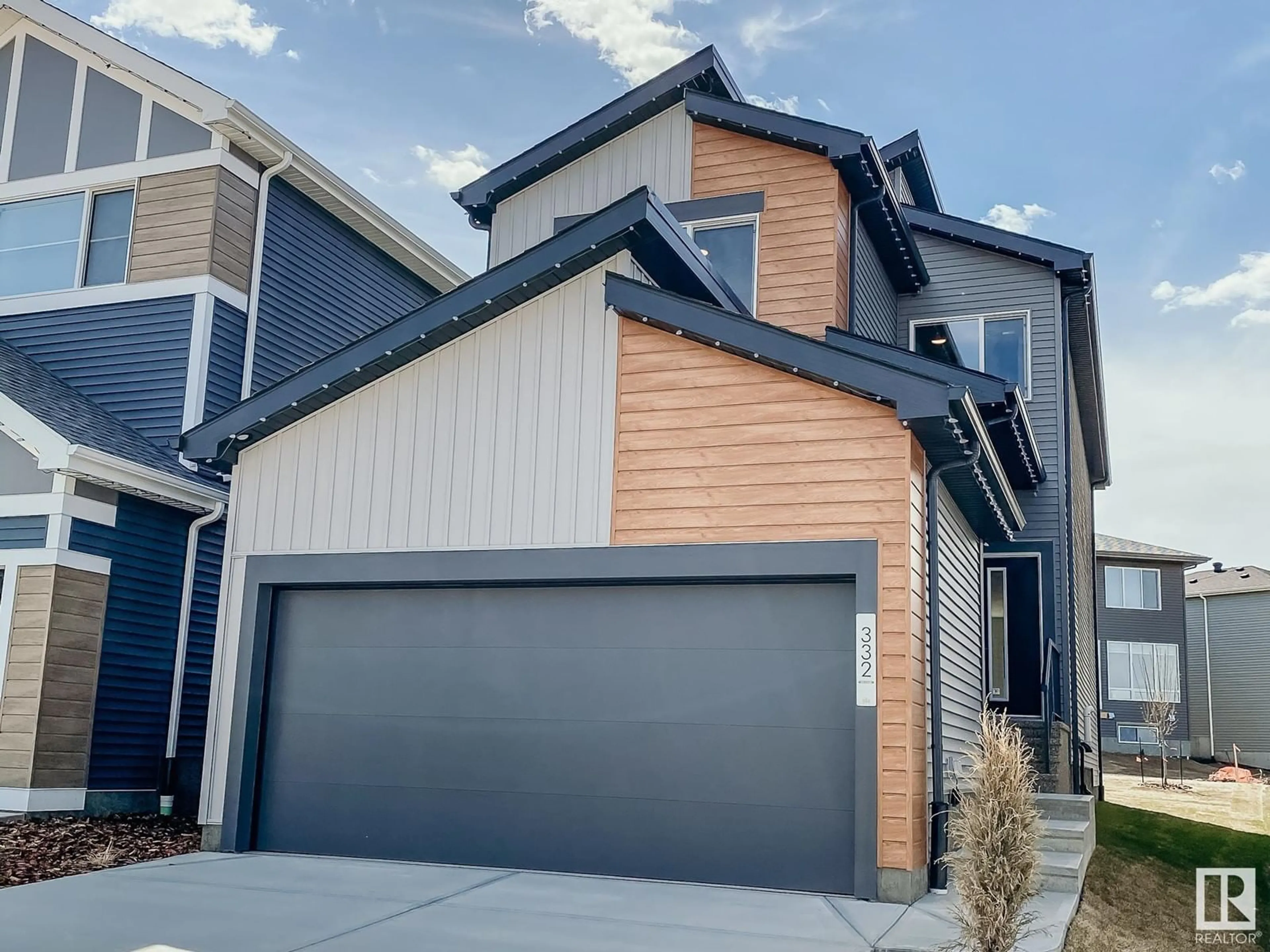 Home with vinyl exterior material, street for 8115 227 ST NW, Edmonton Alberta T5T4N5