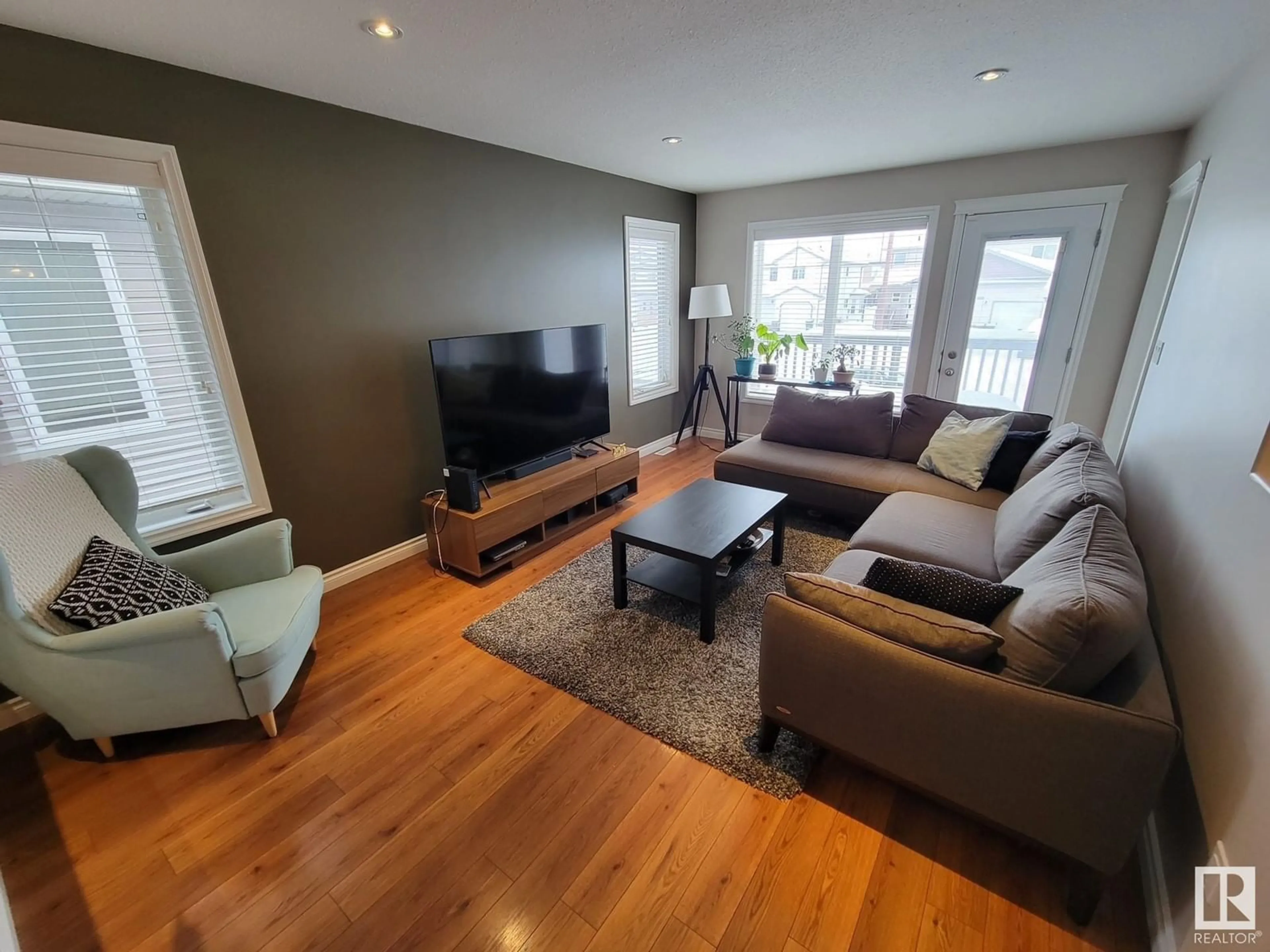 Living room with furniture, wood/laminate floor for 6502B 47 ST, Cold Lake Alberta T9M0B1