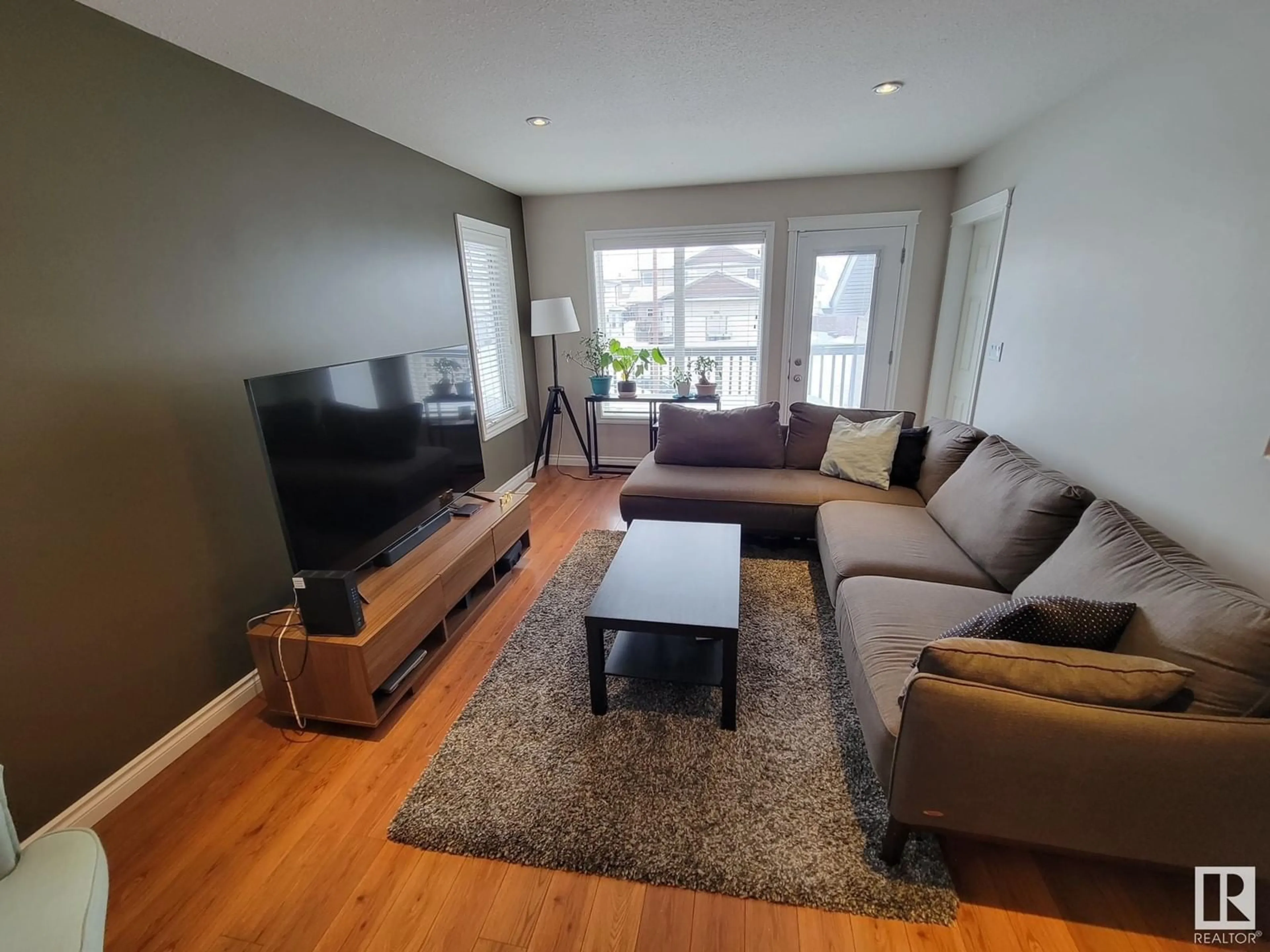 Living room with furniture, wood/laminate floor for 6502B 47 ST, Cold Lake Alberta T9M0B1