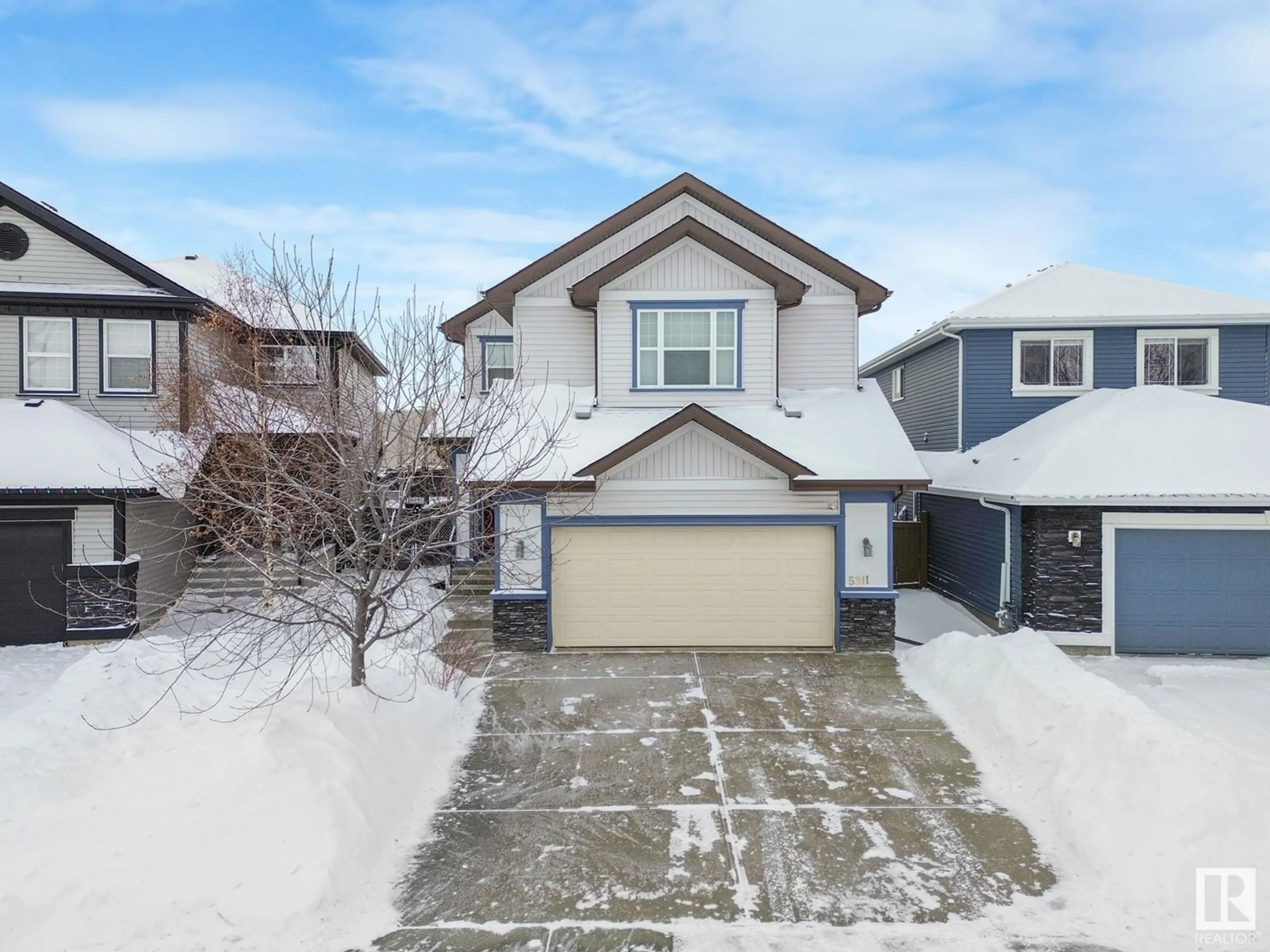 A pic from outside/outdoor area/front of a property/back of a property/a pic from drone, street for 5911 168 AV NW, Edmonton Alberta T5Y0P4