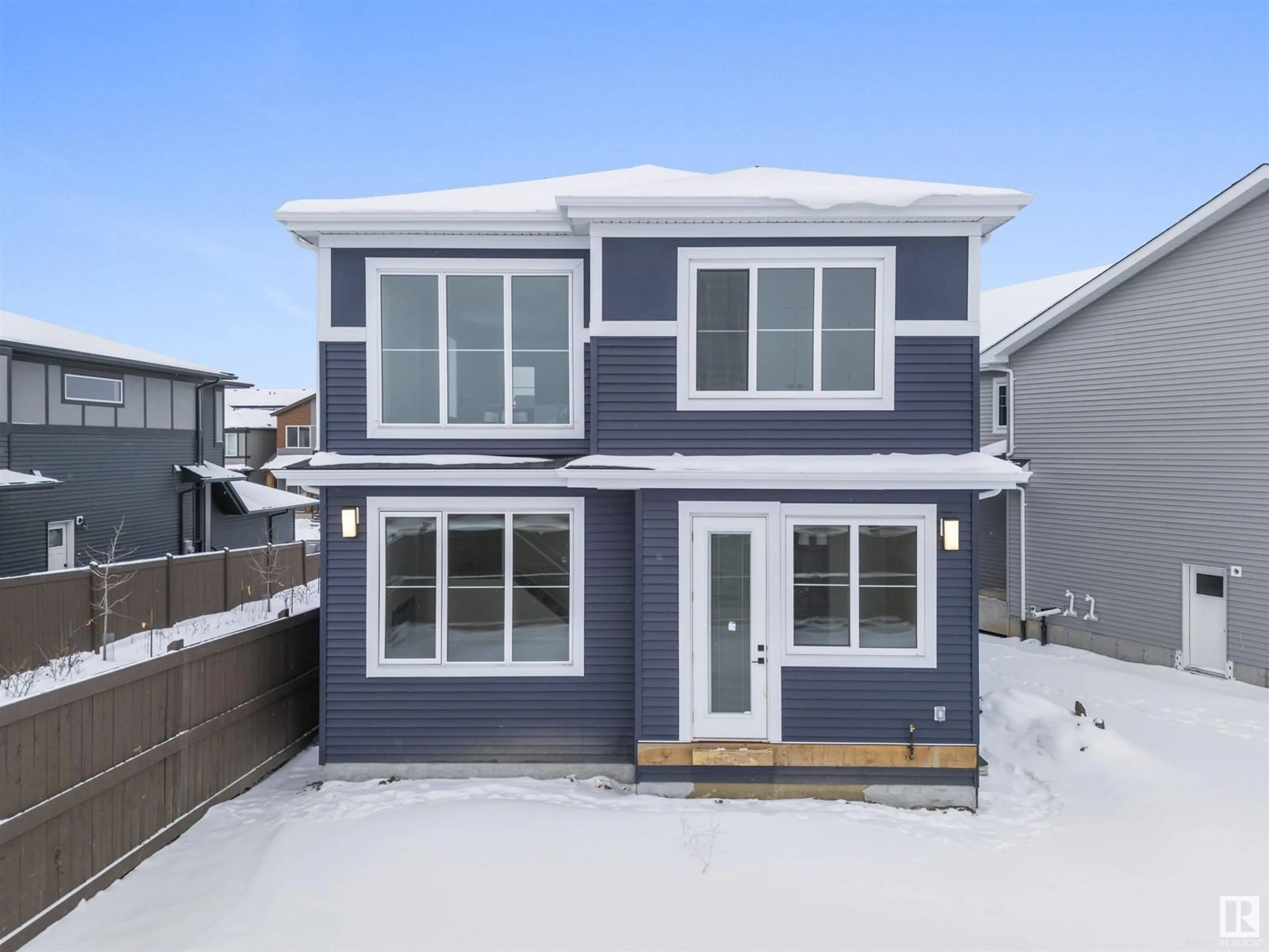Home with vinyl exterior material, street for SW - 1299 PODERSKY WD, Edmonton Alberta T6W5E4