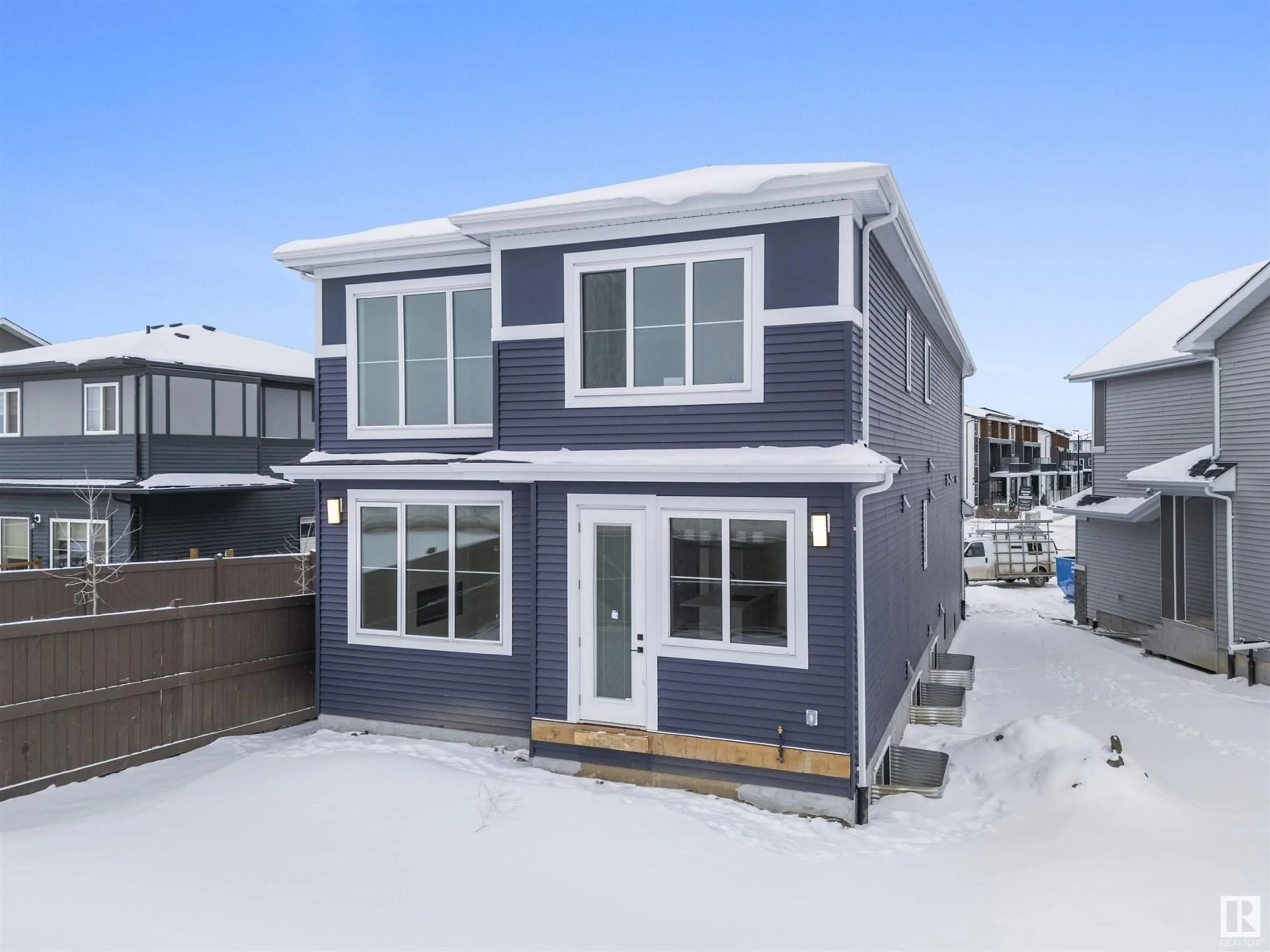 Home with vinyl exterior material, street for SW - 1299 PODERSKY WD, Edmonton Alberta T6W5E4