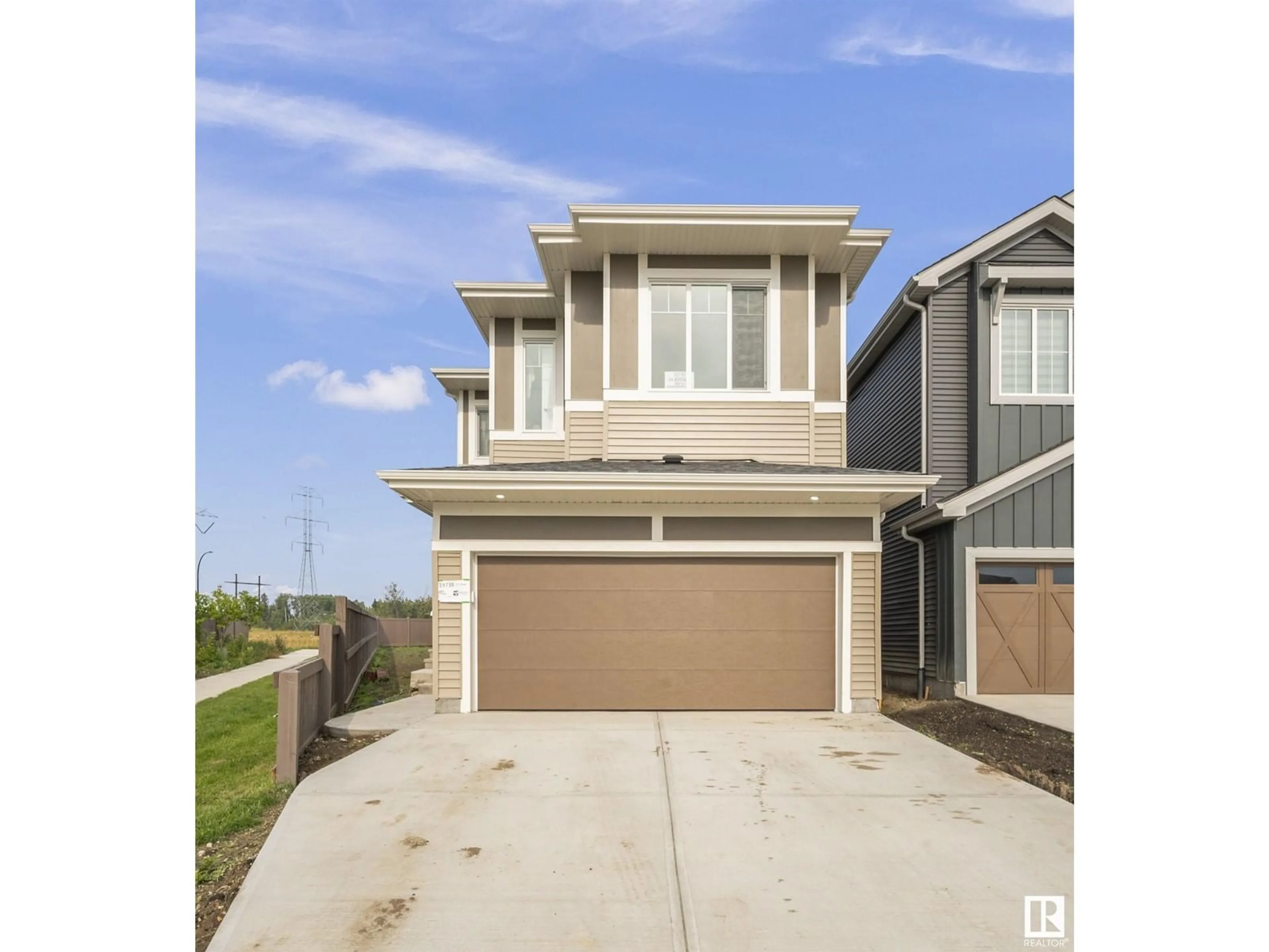 Home with vinyl exterior material, street for 19738 29 AV NW, Edmonton Alberta T6M2N6