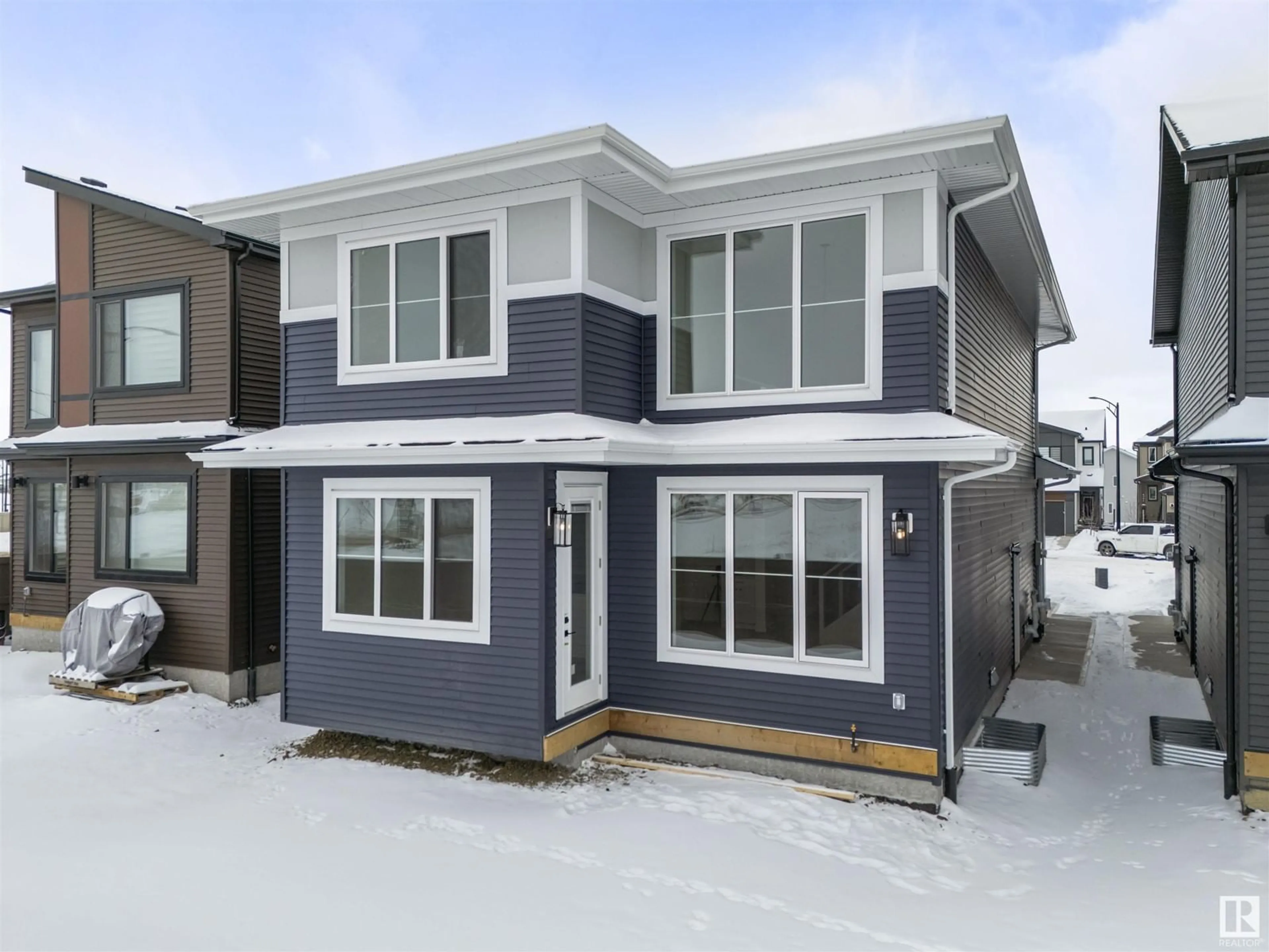 Home with vinyl exterior material, street for 1515 PODERSKY PL SW, Edmonton Alberta T6W4W4