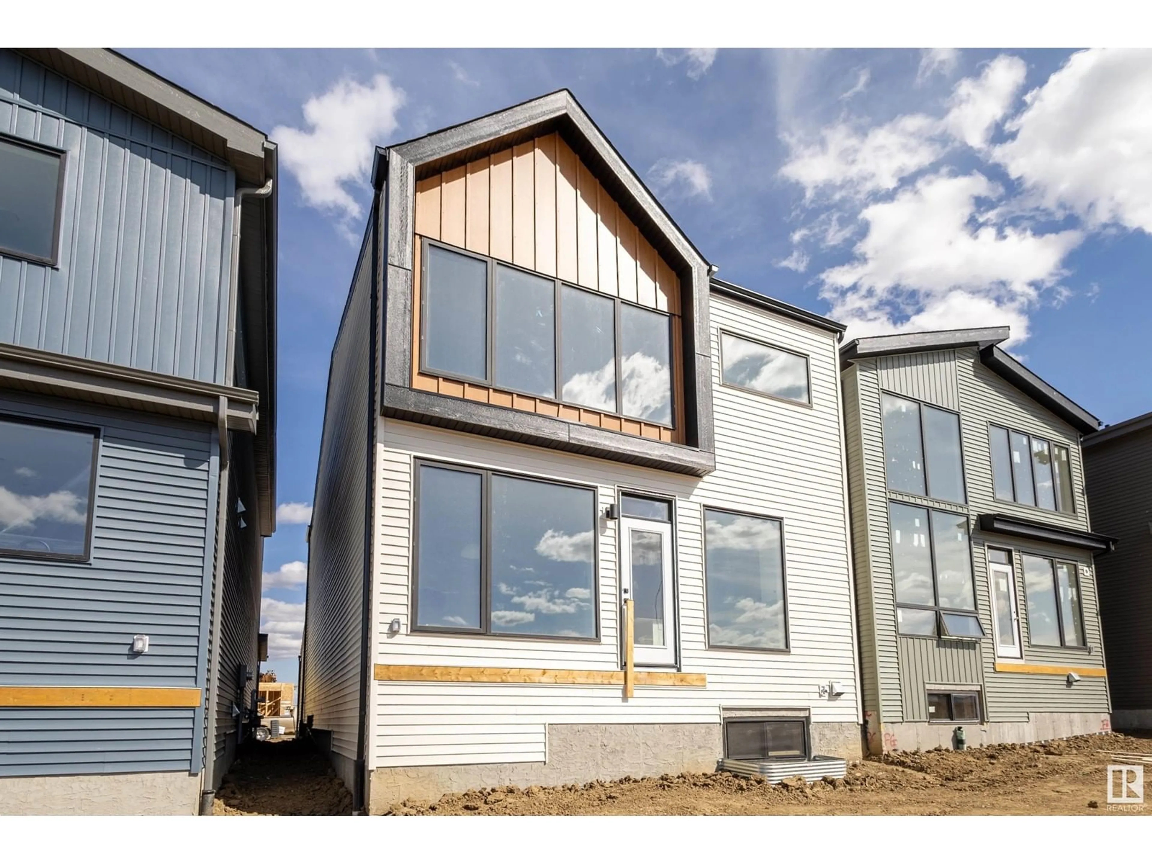 Home with vinyl exterior material, street for SW - 452 33 ST, Edmonton Alberta T6X3C9