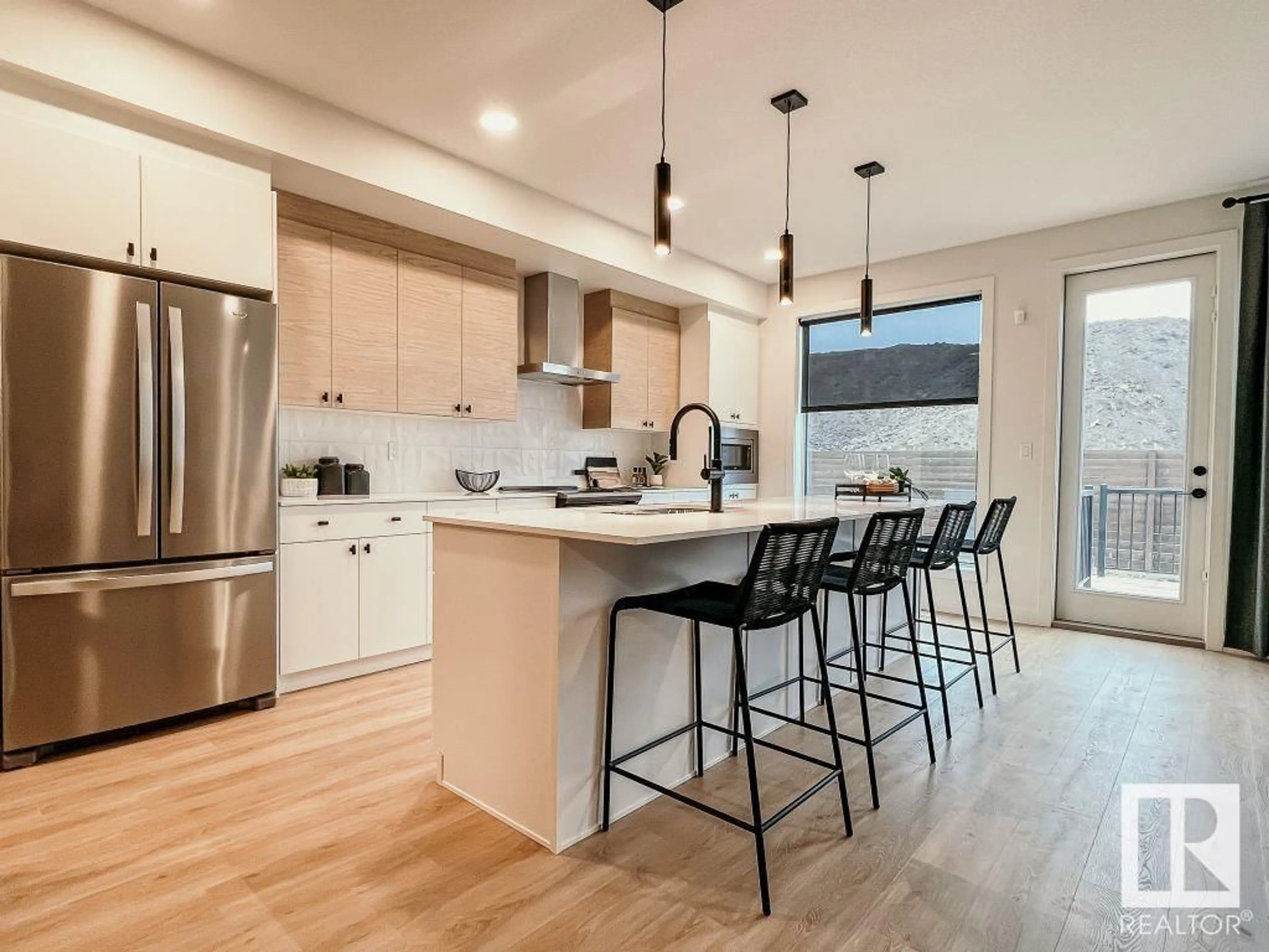 Open concept kitchen, unknown for 452 33 ST SW, Edmonton Alberta T6X3C9