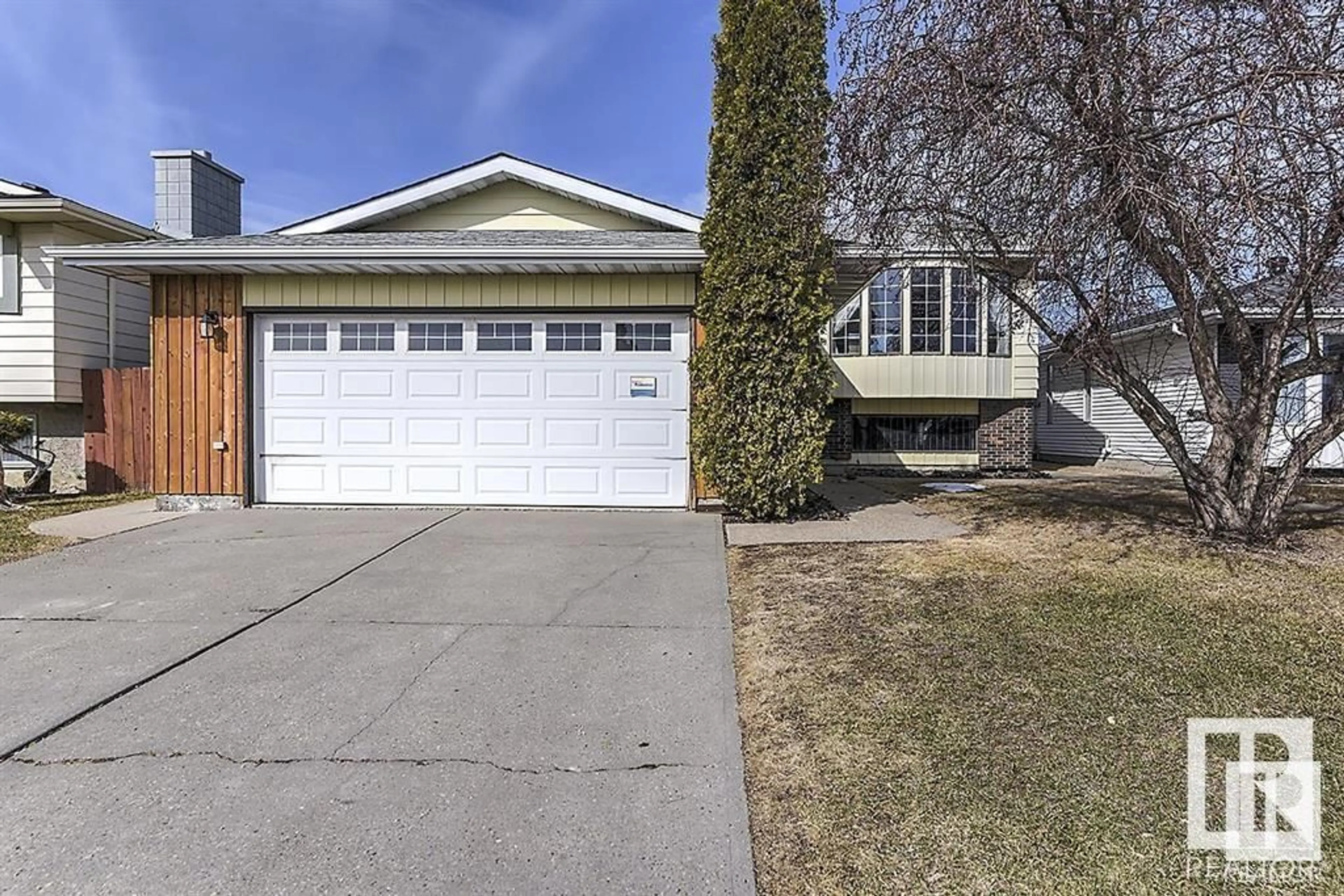 Home with vinyl exterior material, street for 16108 101 ST NW NW, Edmonton Alberta T5X5A4