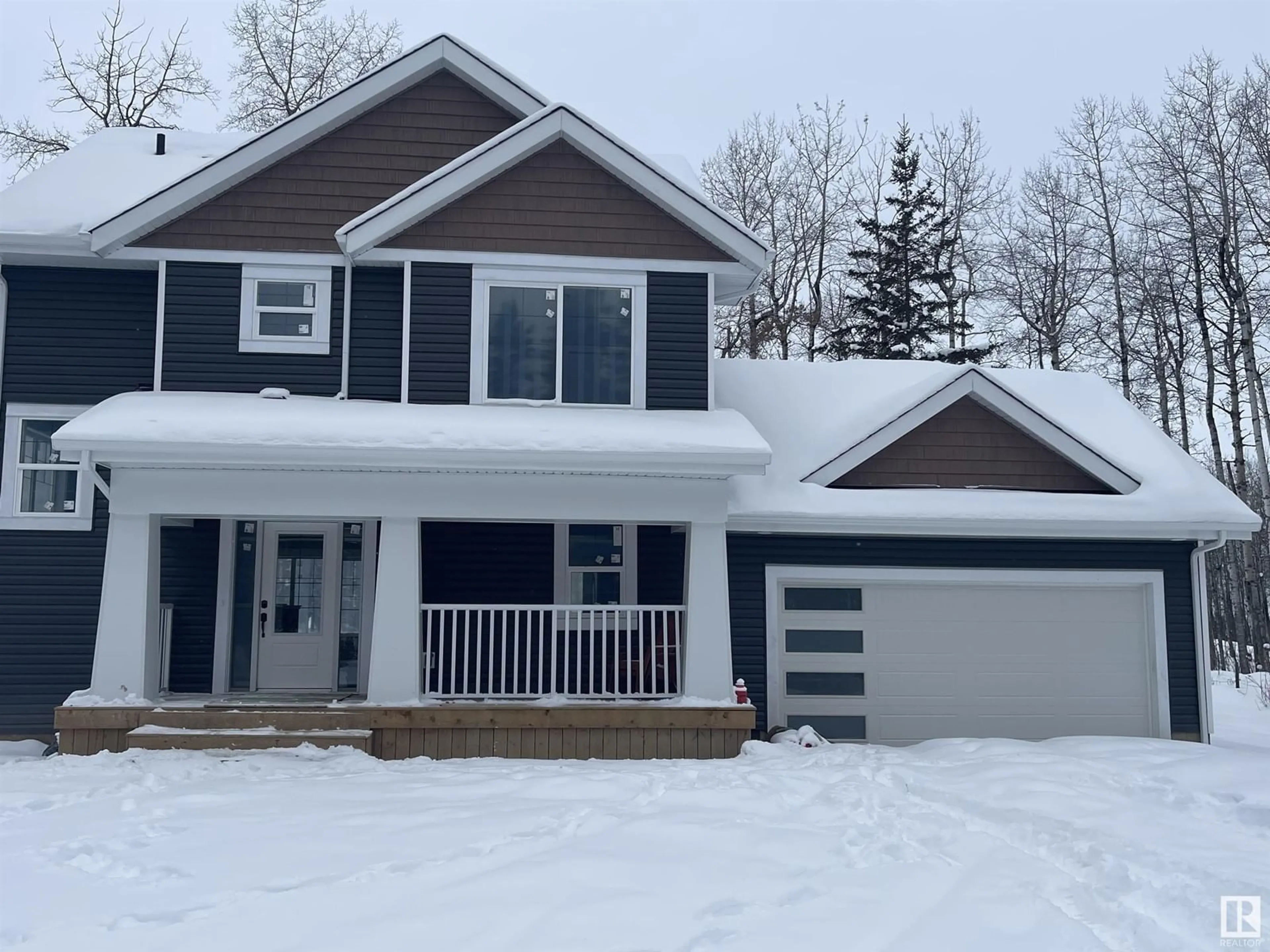 Home with vinyl exterior material, street for 54020 RGE ROAD 51, Rural Lac Ste. Anne County Alberta T0E0L0