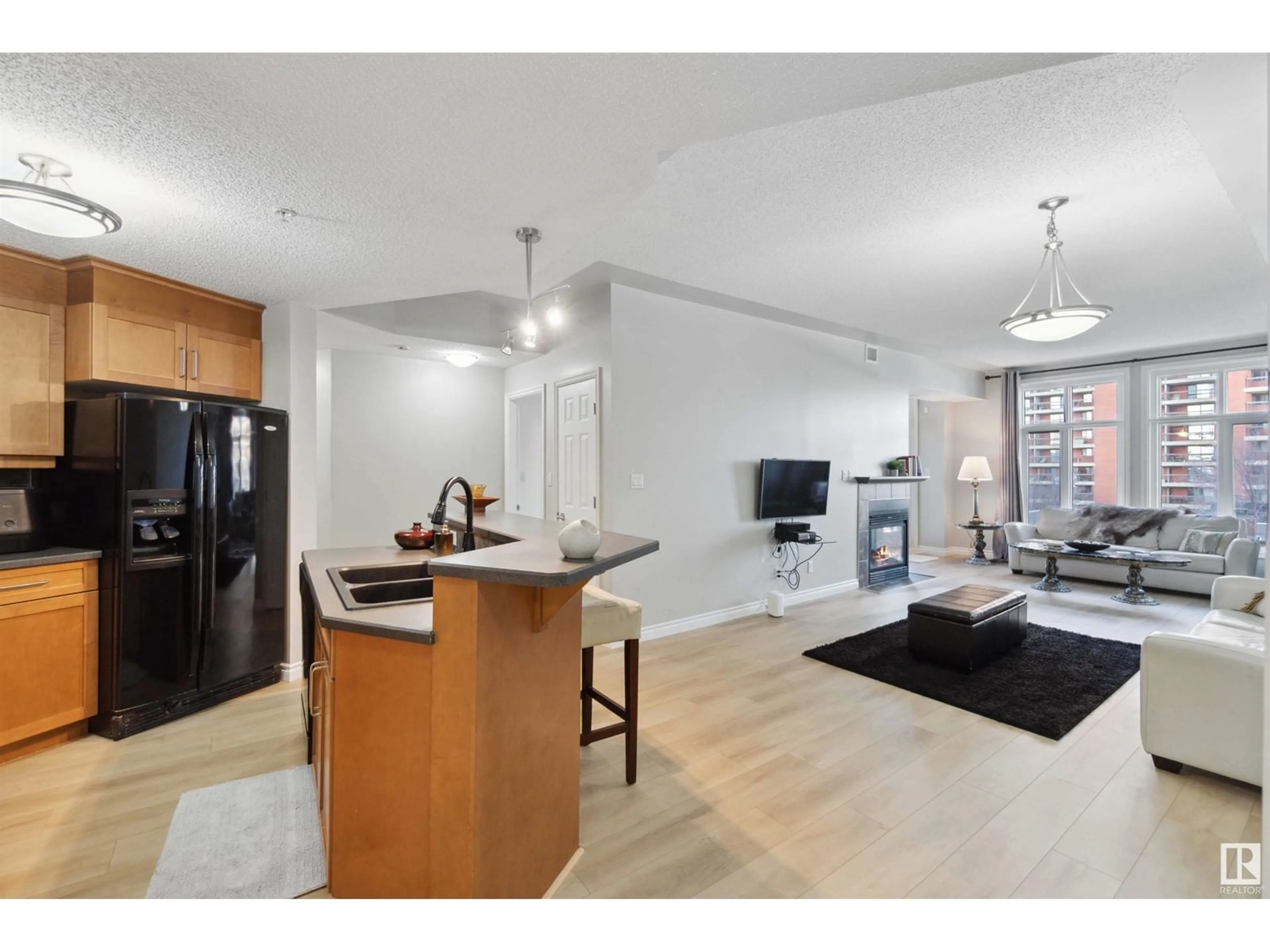 Open concept kitchen, unknown for #402 9020 JASPER AV NW, Edmonton Alberta T5H3S8