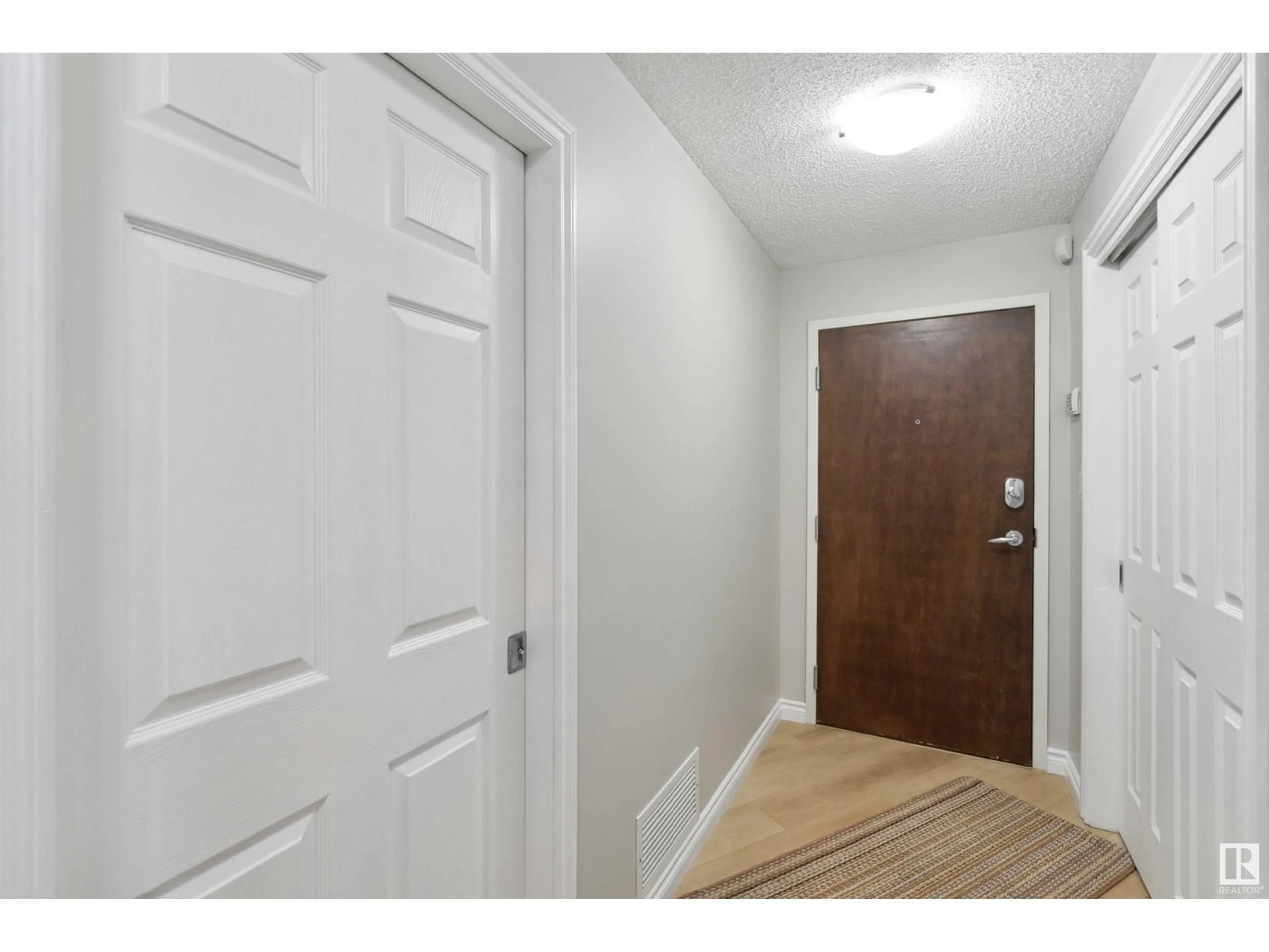 Indoor entryway for #402 9020 JASPER AV NW, Edmonton Alberta T5H3S8