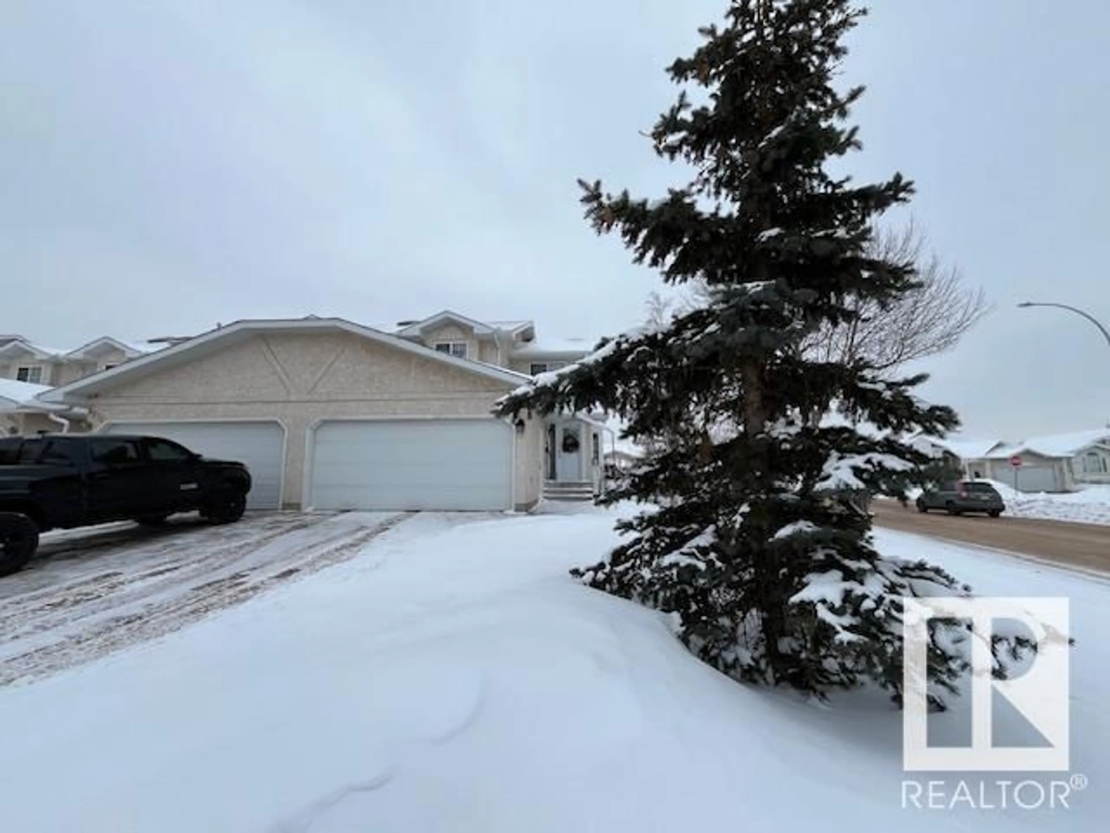 A pic from outside/outdoor area/front of a property/back of a property/a pic from drone, street for 6920 158A AV NW, Edmonton Alberta T5Z3A5