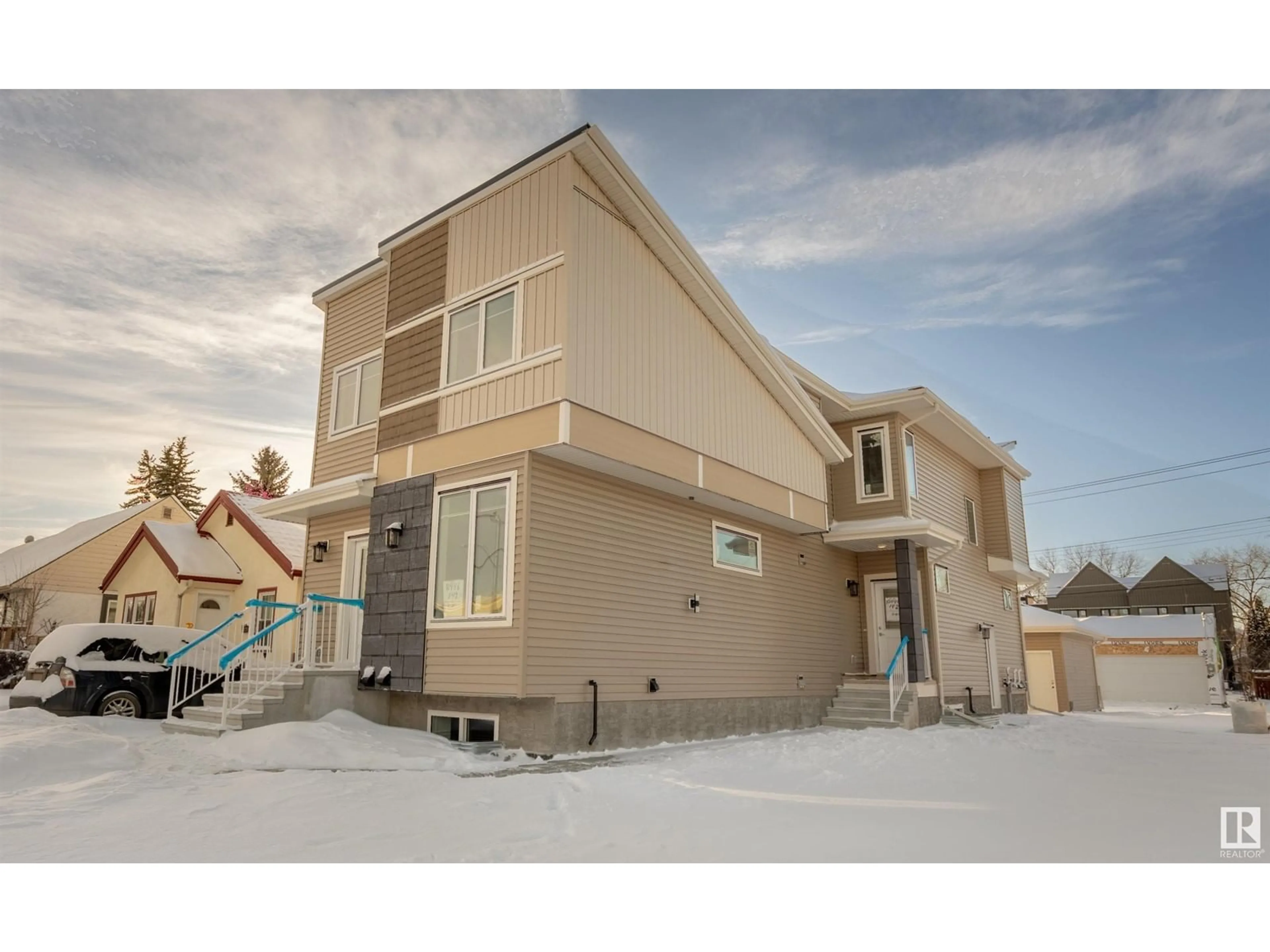 Home with vinyl exterior material, street for 10446 142 ST NW, Edmonton Alberta T5N2P2