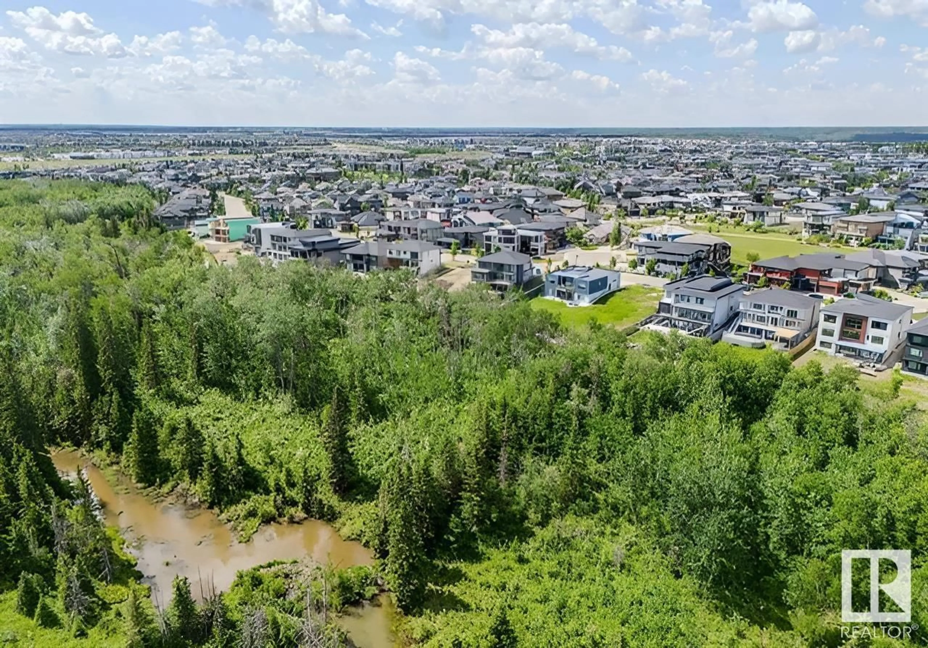 A pic from outside/outdoor area/front of a property/back of a property/a pic from drone, water/lake/river/ocean view for 4097 WHISPERING RIVER DR NW, Edmonton Alberta T6W2E2