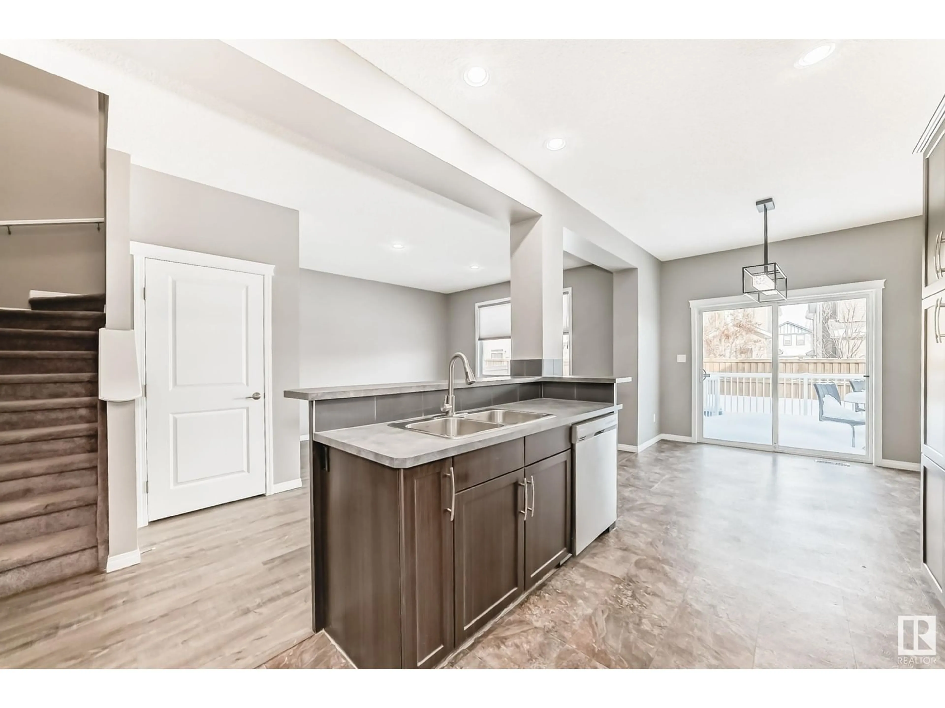 Open concept kitchen, ceramic/tile floor for 5616 175 AV NW, Edmonton Alberta T5Y0T6