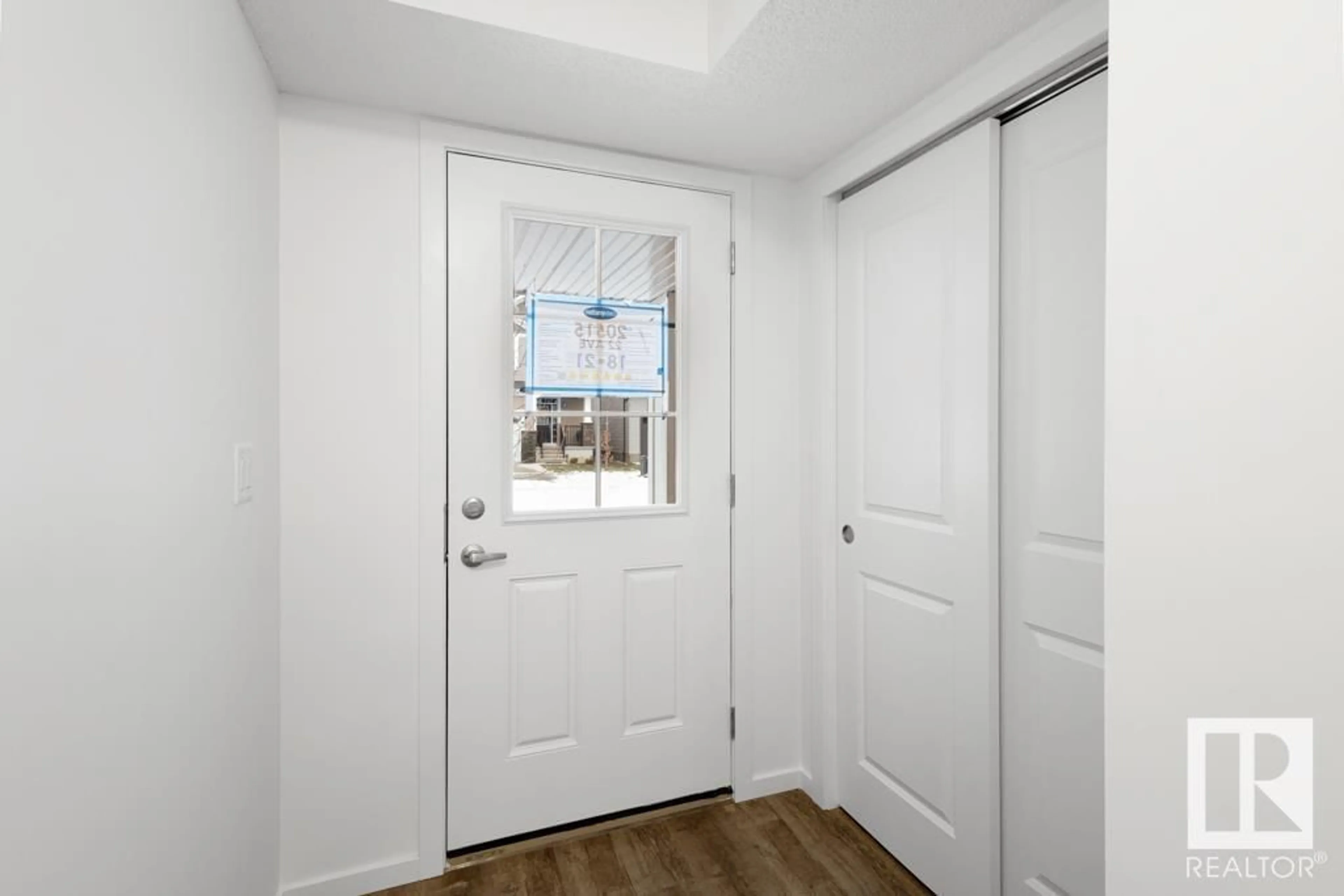 Indoor entryway for 20434 15A AV NW, Edmonton Alberta T6M2P7