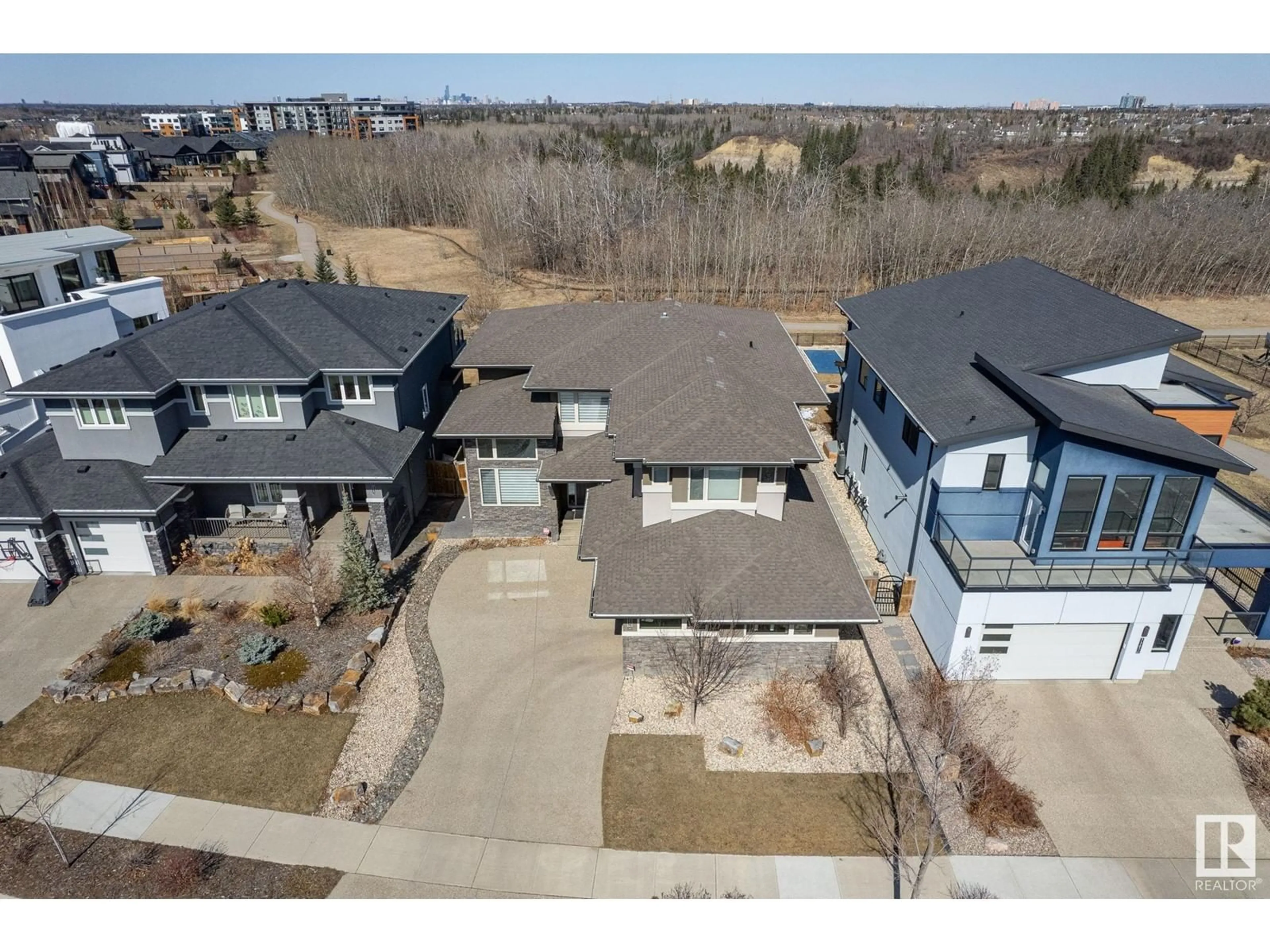 A pic from outside/outdoor area/front of a property/back of a property/a pic from drone, street for 7311 MAY CM NW, Edmonton Alberta T6R0V7