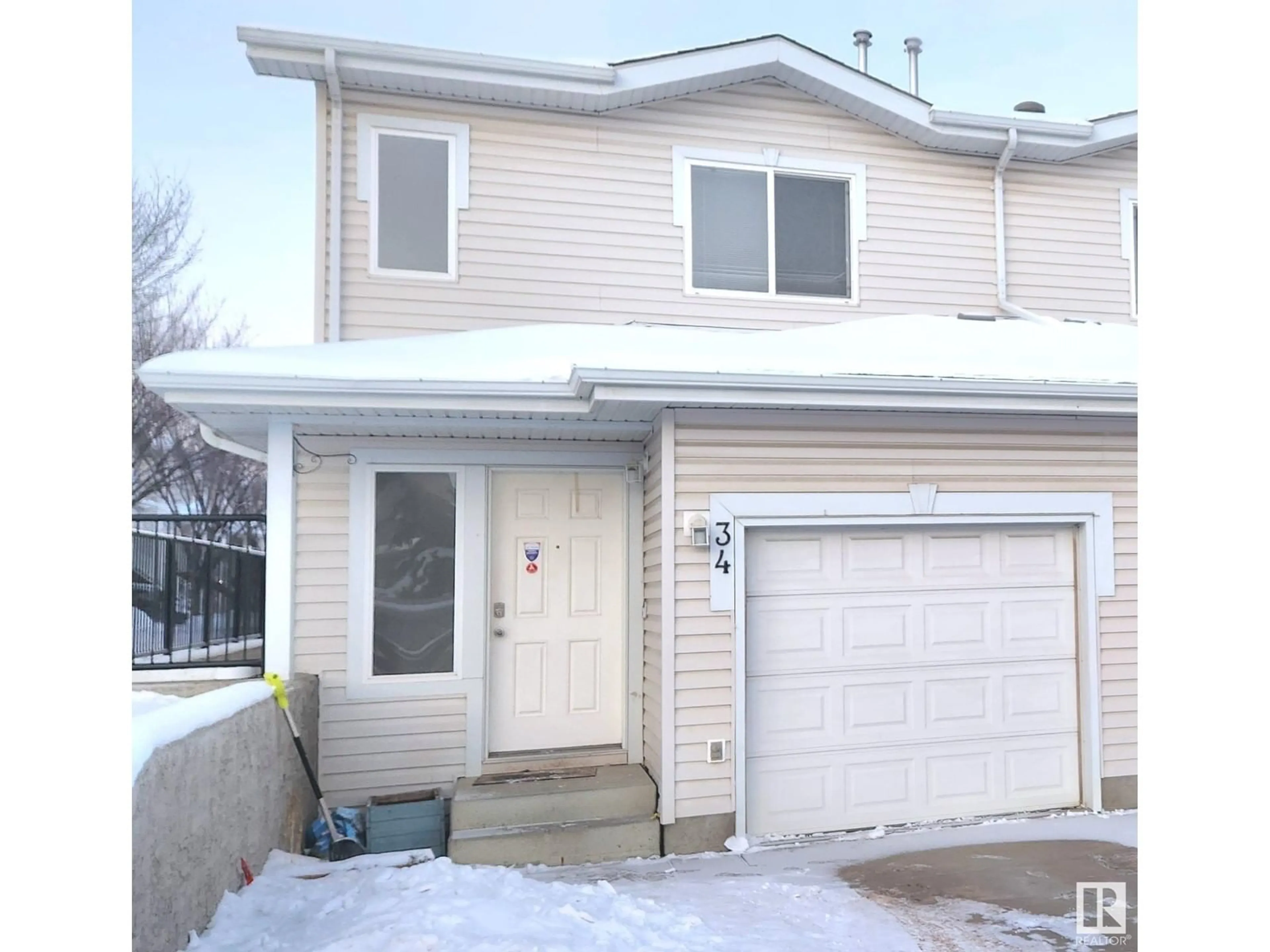 Home with vinyl exterior material, street for #34 130 HYNDMAN CR NW, Edmonton Alberta T5A0E8