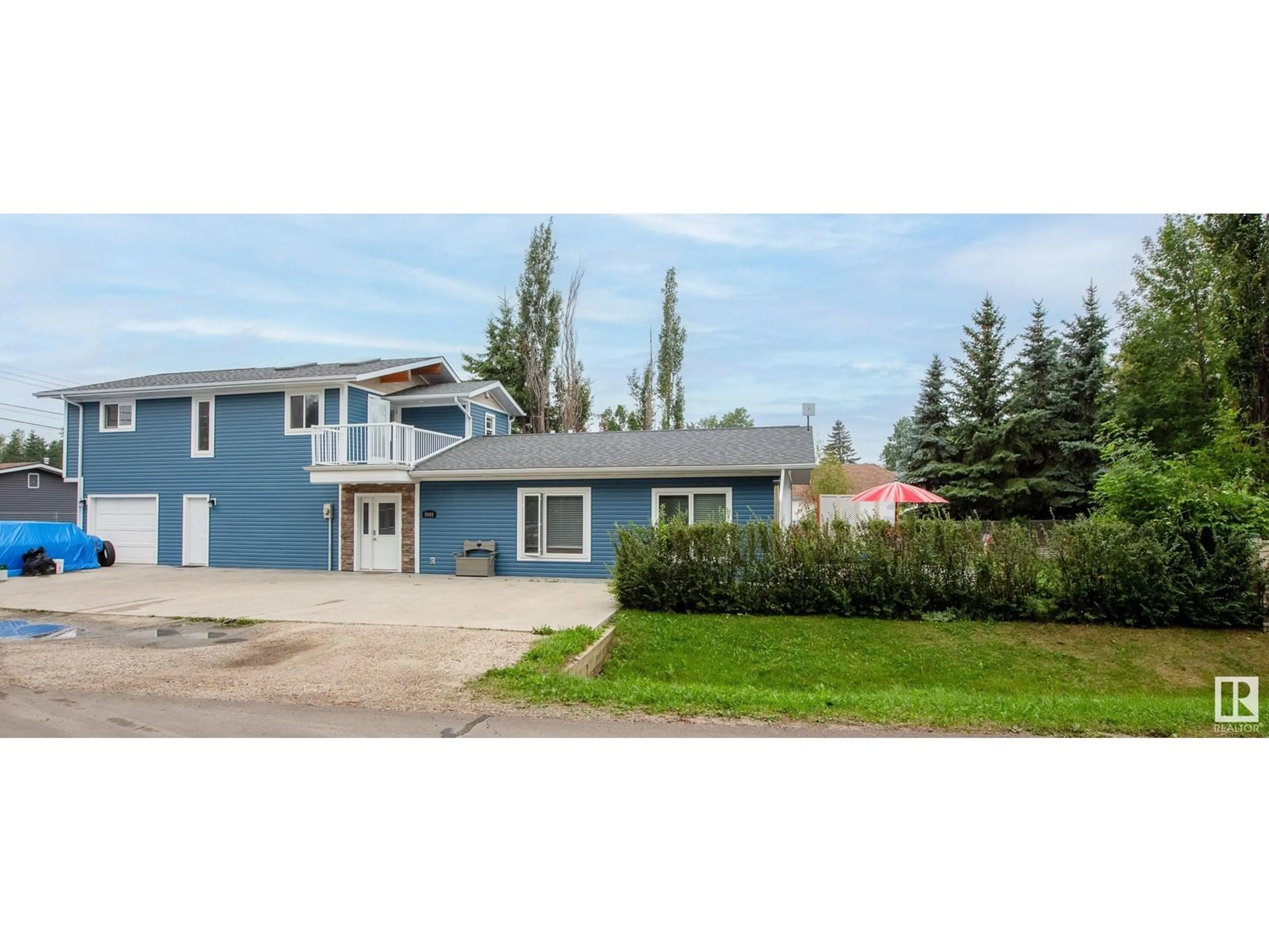 Home with vinyl exterior material, street for 5503 50 AV, Rural Lac Ste. Anne County Alberta T0E0A0