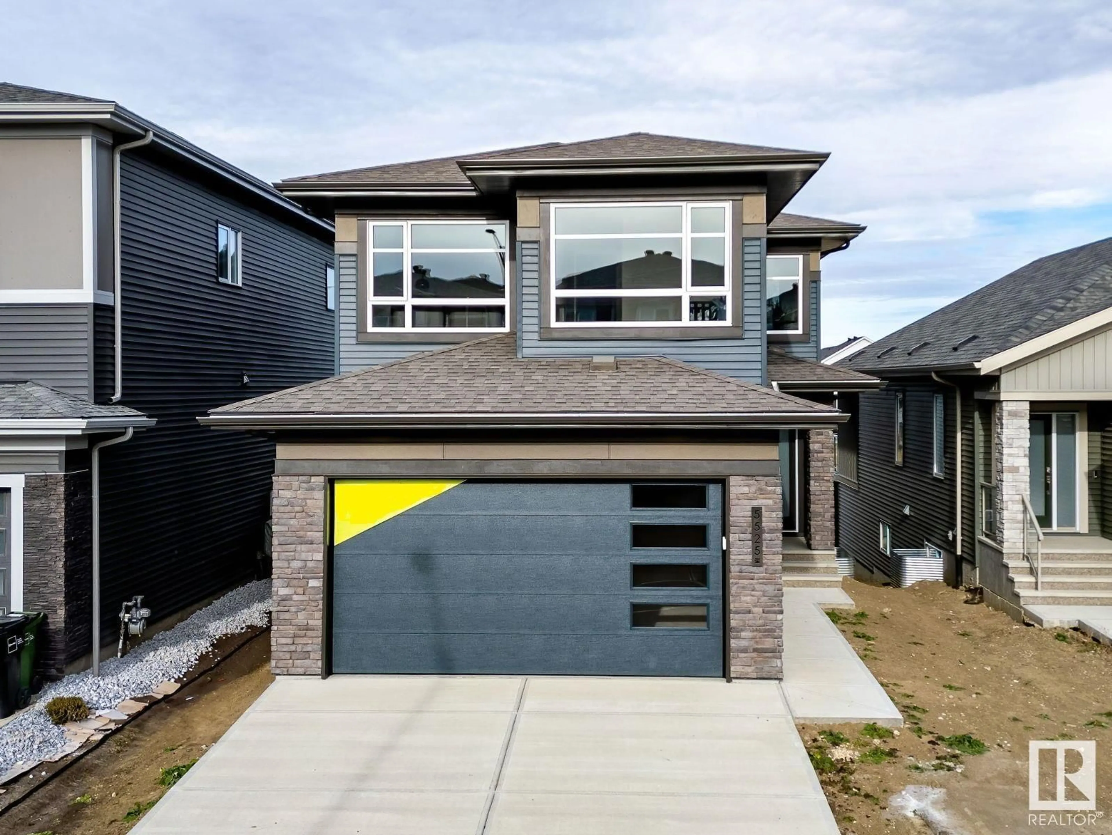 Home with brick exterior material, street for 5525 KOOTOOK RD SW, Edmonton Alberta T6W1A5