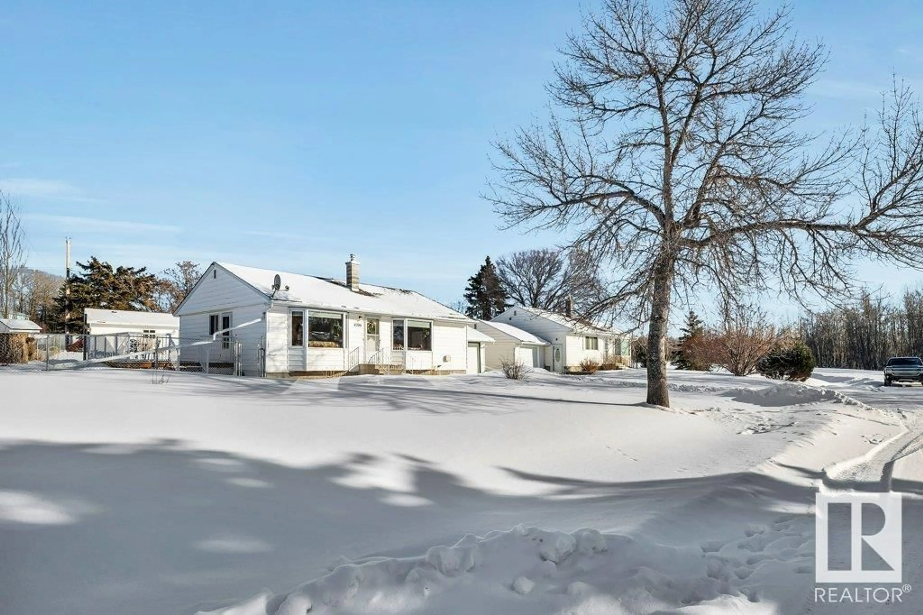 A pic from outside/outdoor area/front of a property/back of a property/a pic from drone, street for 4706 32 St, Rural Wetaskiwin County Alberta T0C2C0