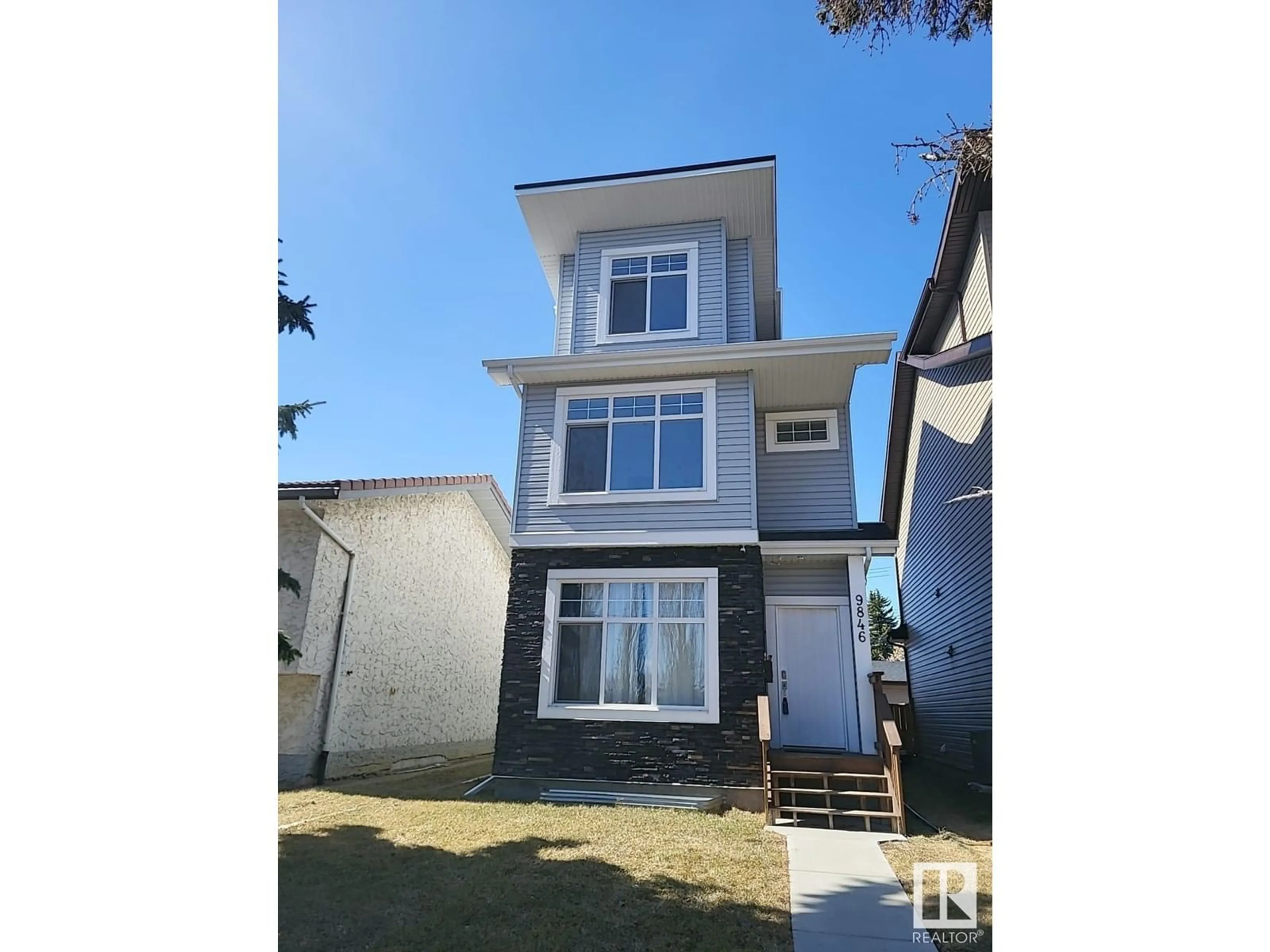 Home with vinyl exterior material, street for NW - 9846 162 ST, Edmonton Alberta T5P3L2