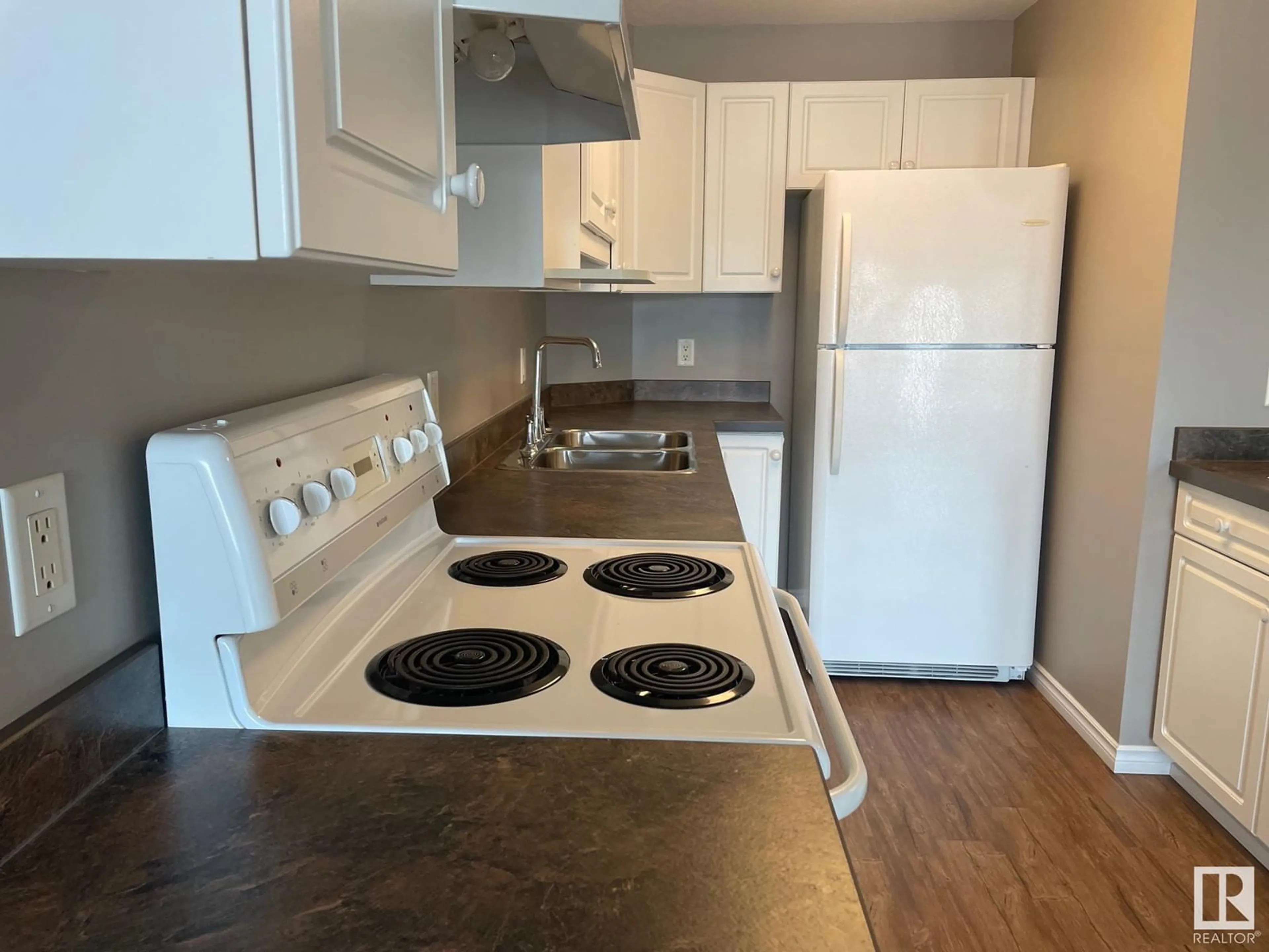 Standard kitchen, wood/laminate floor for #304 2741 55 ST NW, Edmonton Alberta T6L7G7