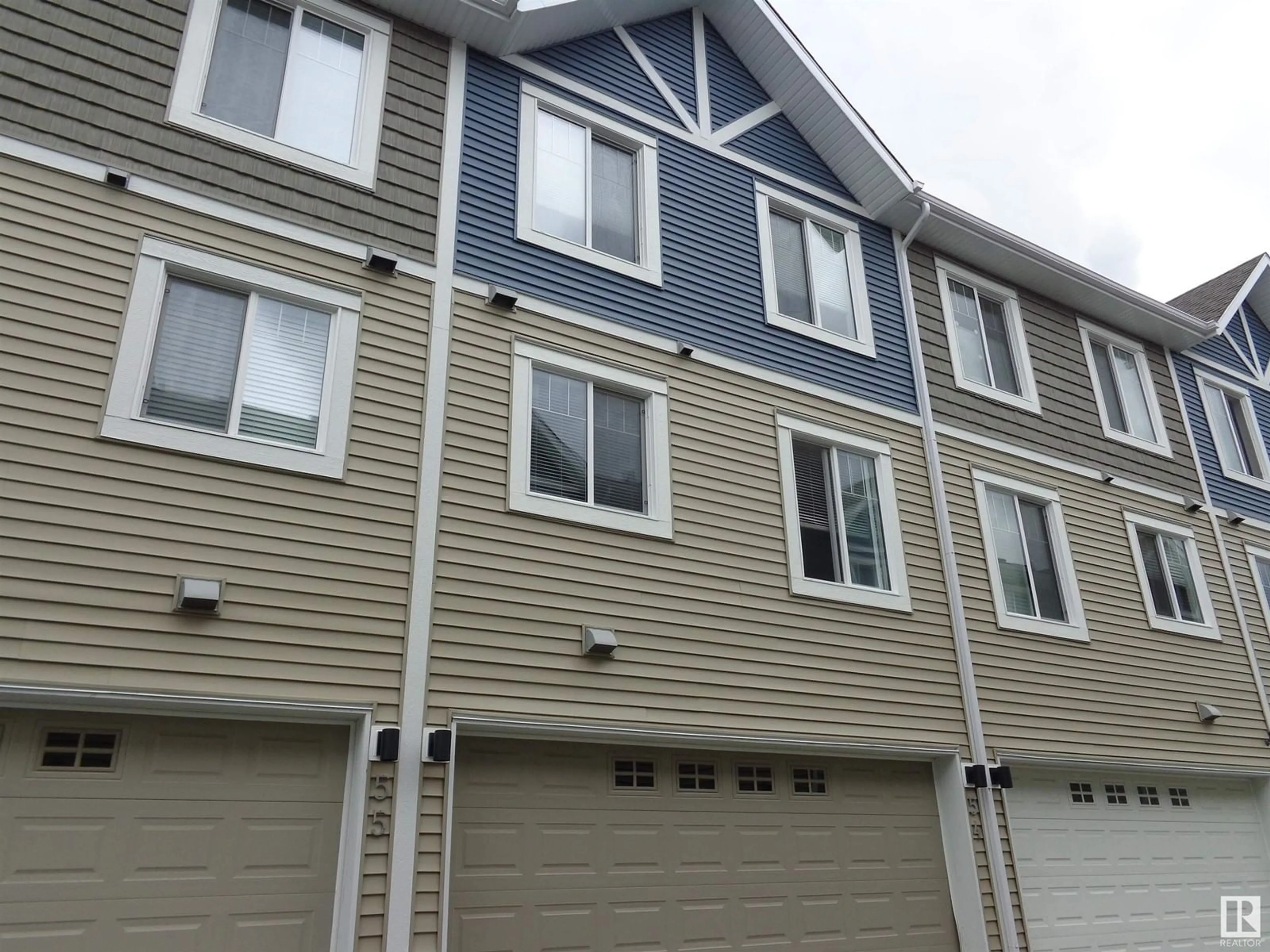 Home with vinyl exterior material, street for #54 415 CLAREVIEW RD NW, Edmonton Alberta T5A0Z6