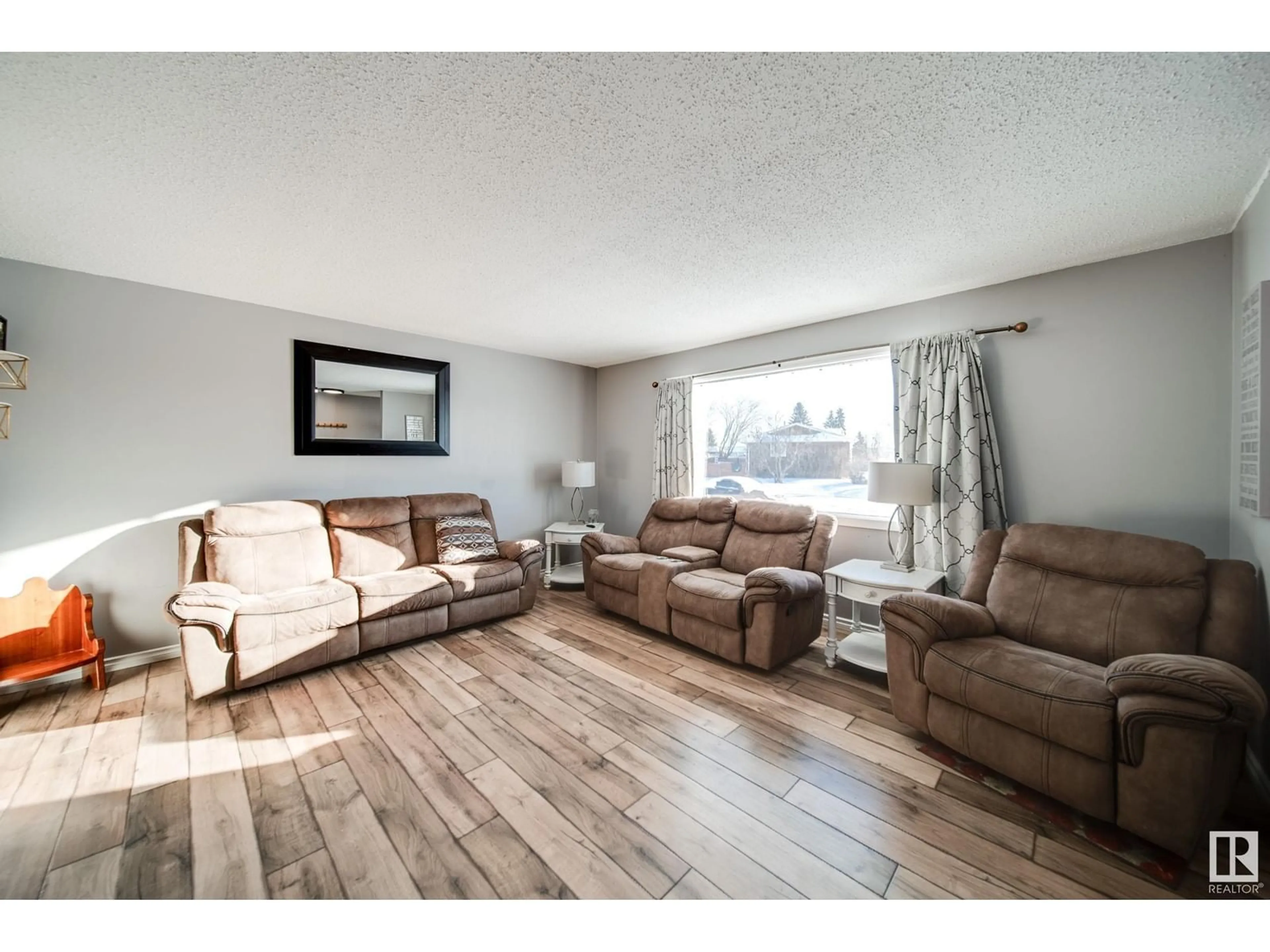 Living room with furniture, wood/laminate floor for 5408 51 ST, Gibbons Alberta T0A1N0