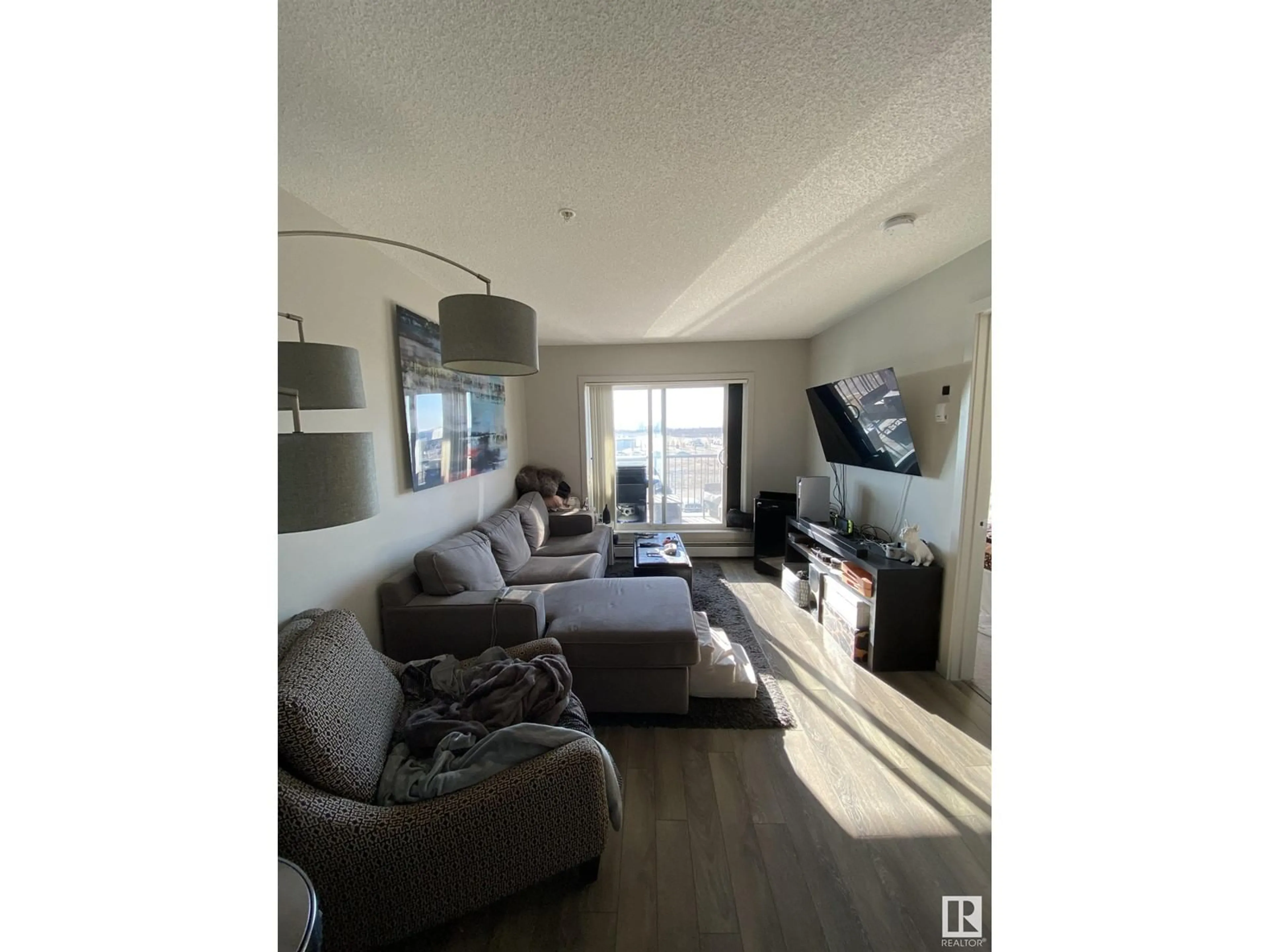 Living room with furniture, unknown for #335 390 WINDERMERE RD NW, Edmonton Alberta T6W0R1