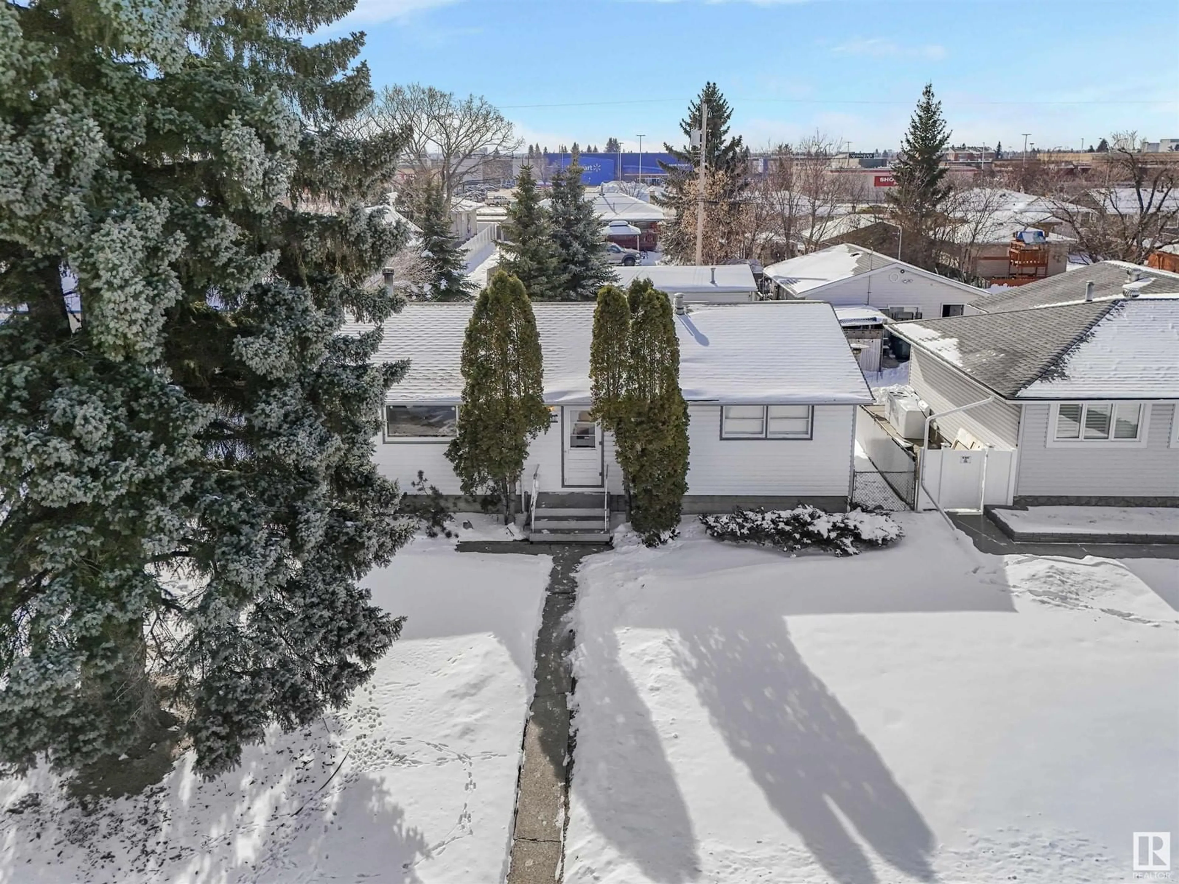 A pic from outside/outdoor area/front of a property/back of a property/a pic from drone, mountain view for 5211 101A AV NW, Edmonton Alberta T6A0L7