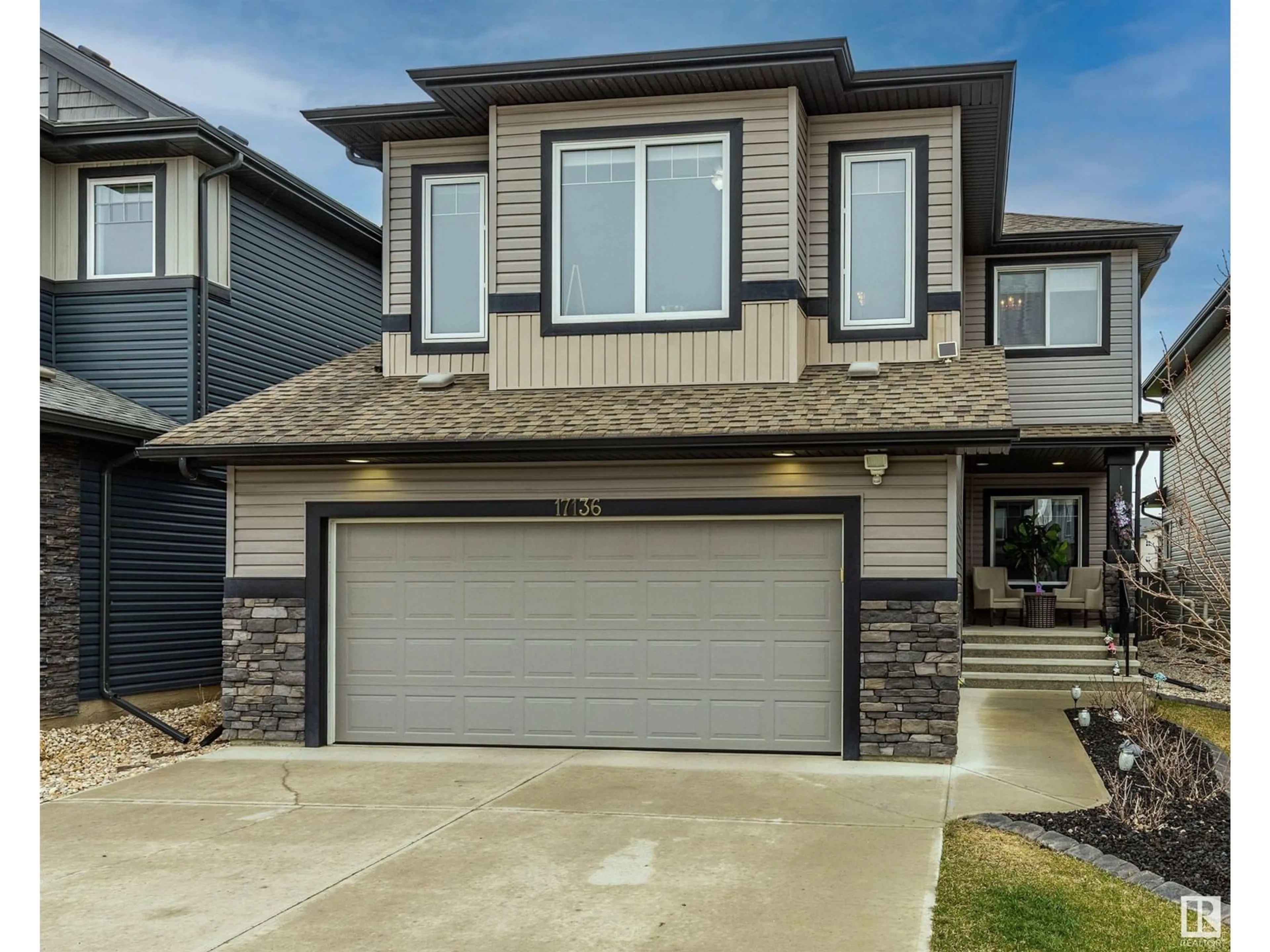 Home with vinyl exterior material, street for 17136 75 ST NW, Edmonton Alberta T5Z0B7