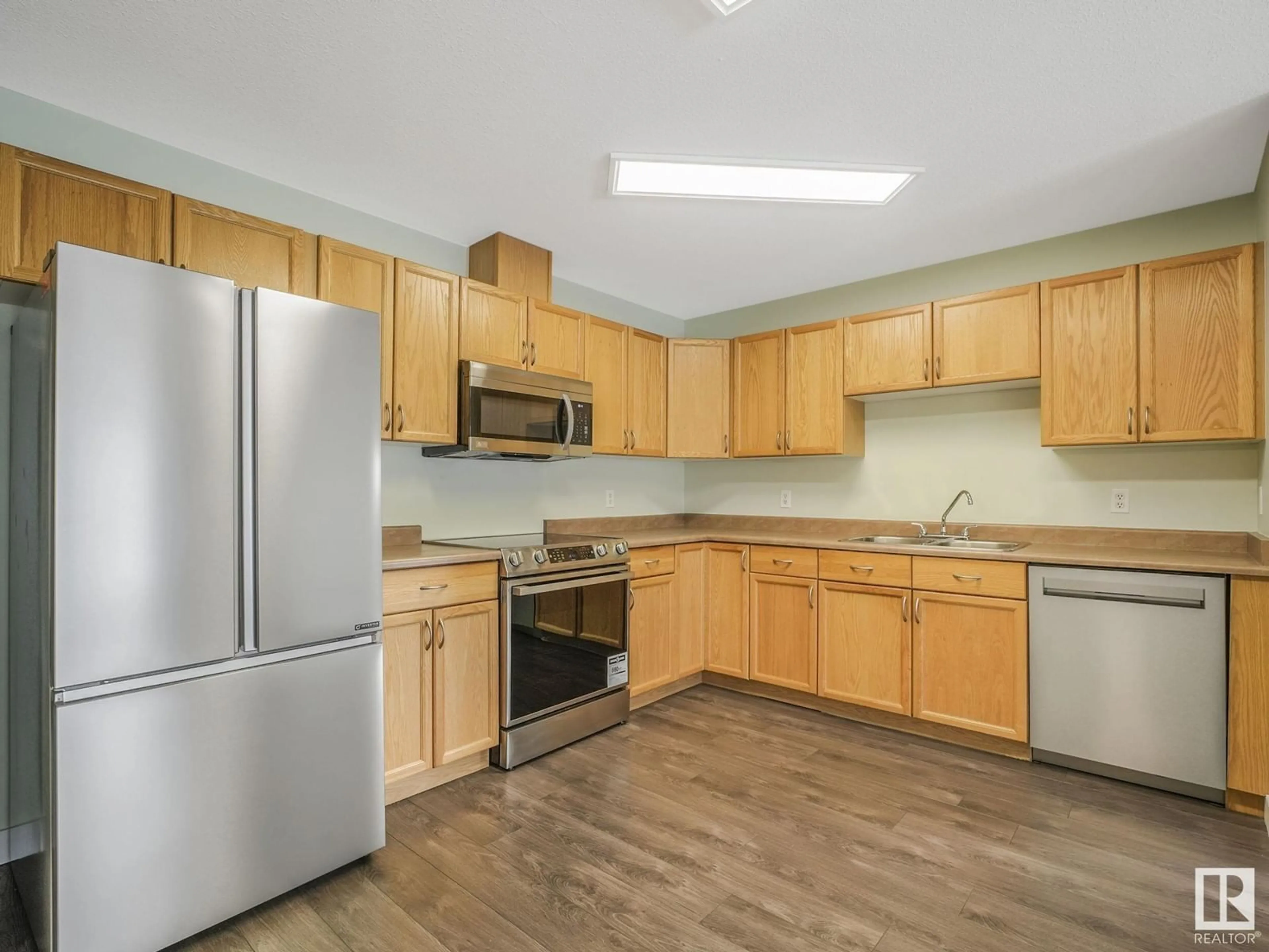 Standard kitchen, wood/laminate floor for #101 4703 43 AV, Stony Plain Alberta T7Z2S7