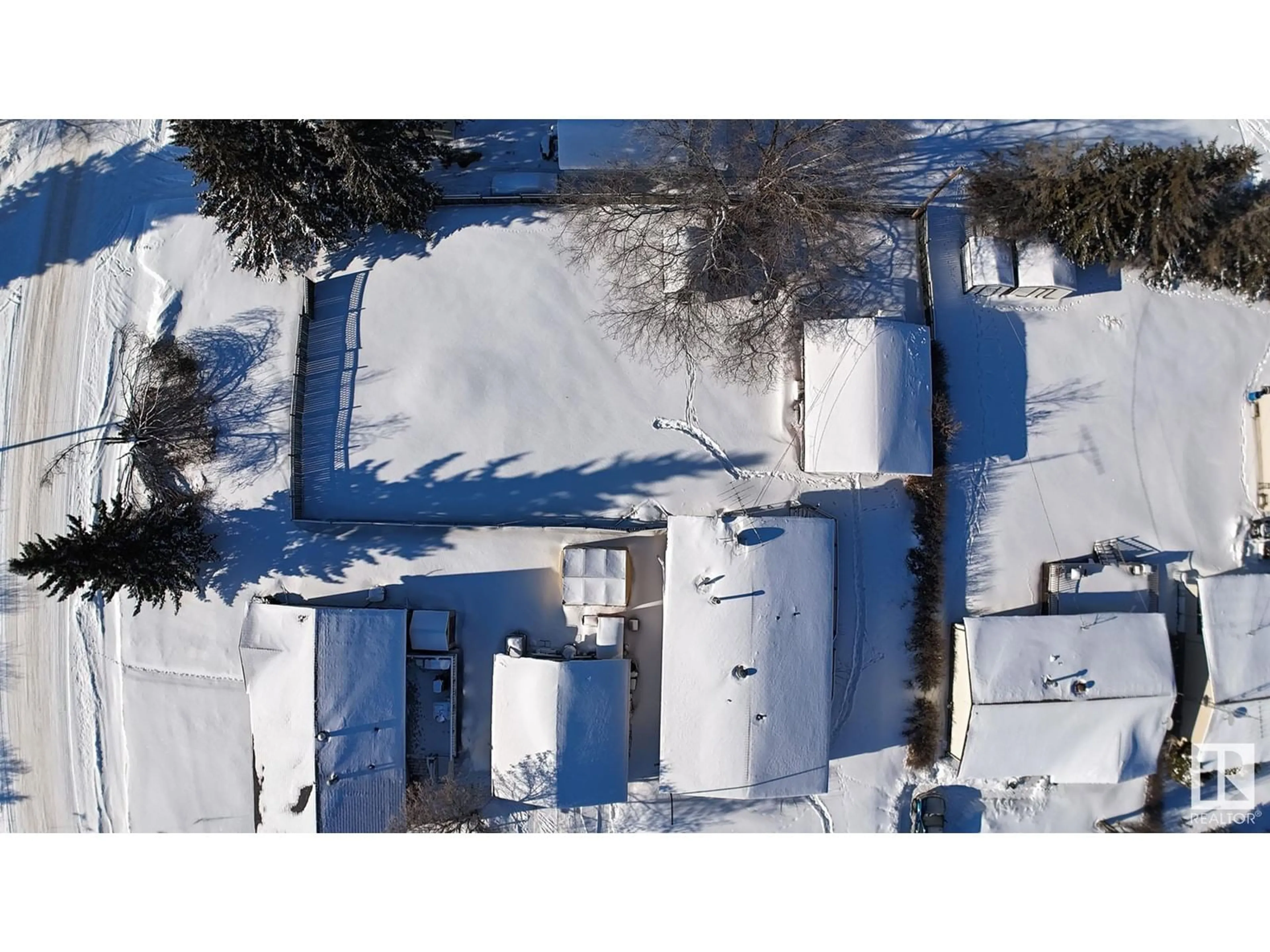 A pic from outside/outdoor area/front of a property/back of a property/a pic from drone, street for 4810 49 st, Andrew Alberta T0B0C0