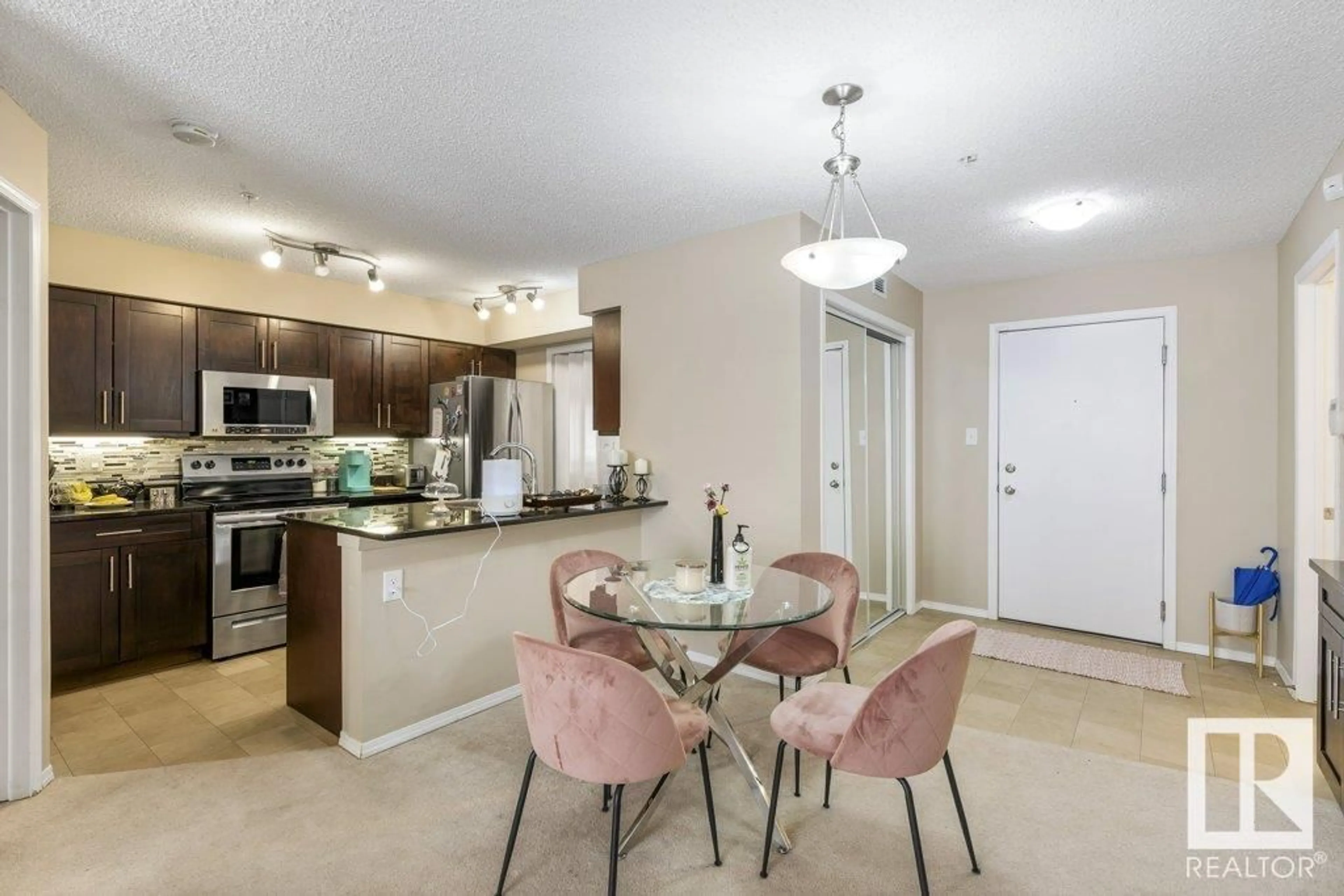 Open concept kitchen, unknown for #107 1070 MCCONACHIE BV NW, Edmonton Alberta T5Y0X1