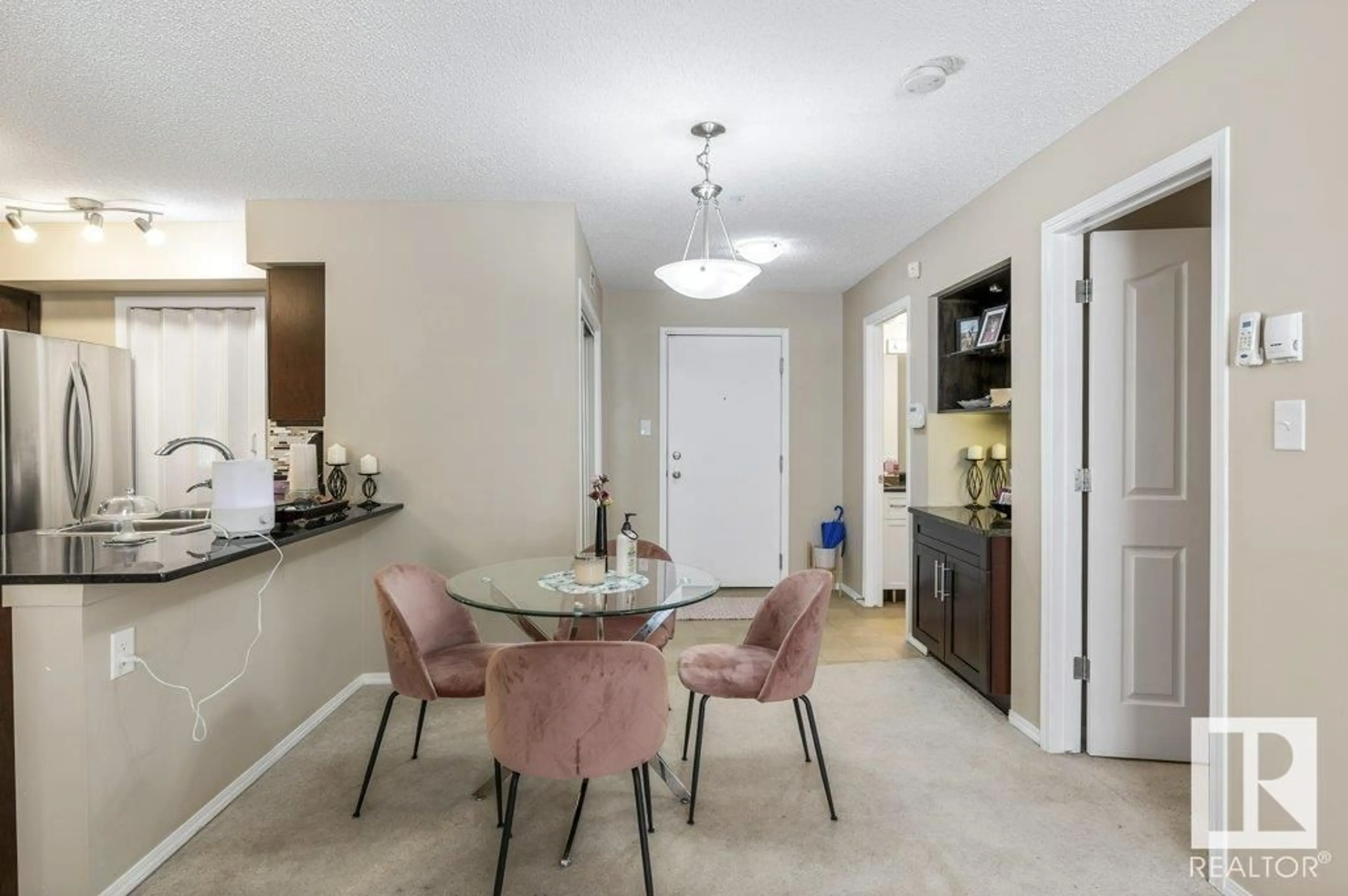 Dining room, ceramic/tile floor for #107 1070 MCCONACHIE BV NW, Edmonton Alberta T5Y0X1