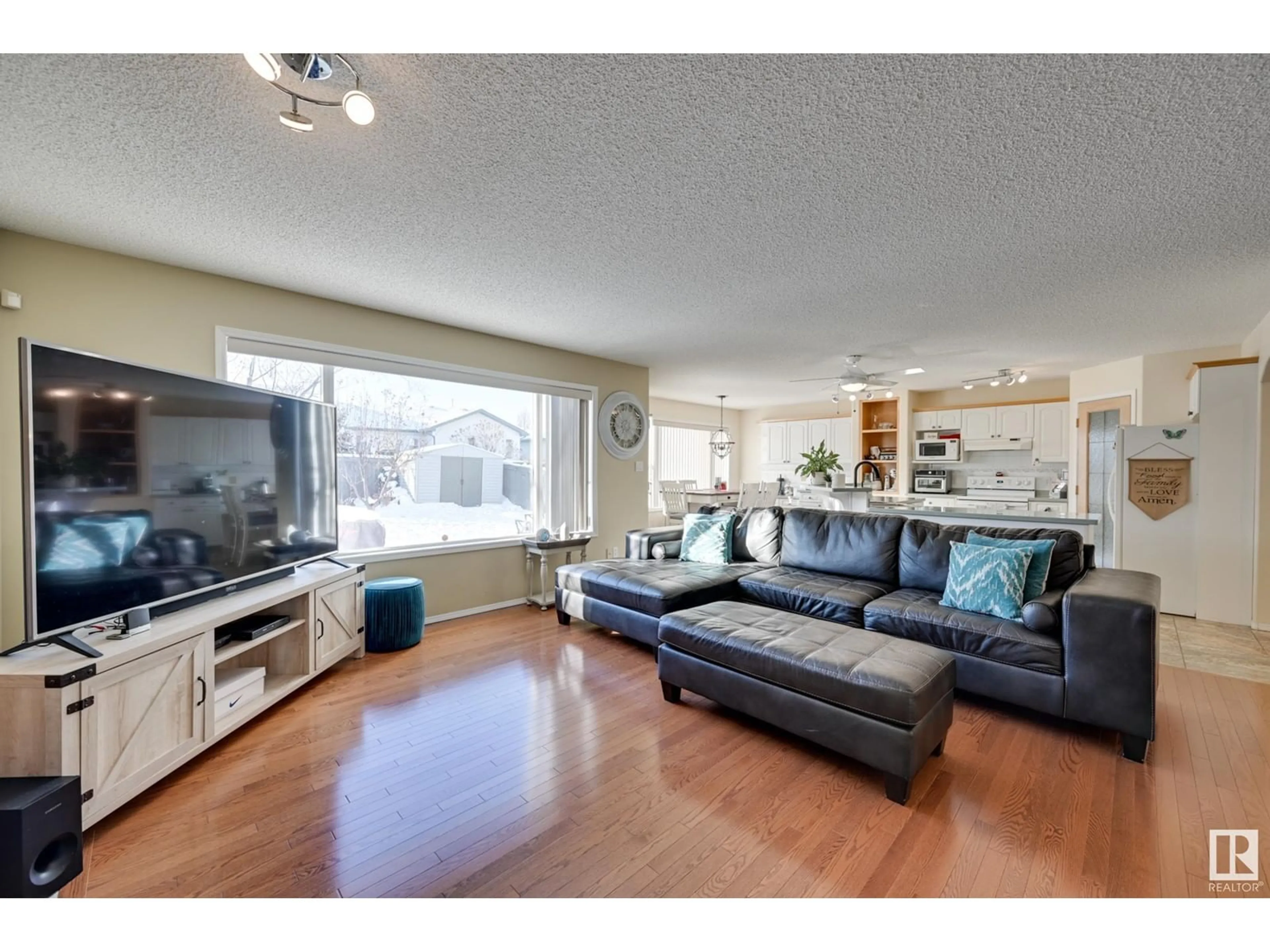 Living room with furniture, wood/laminate floor for 5146 190A ST NW, Edmonton Alberta T6M2R5