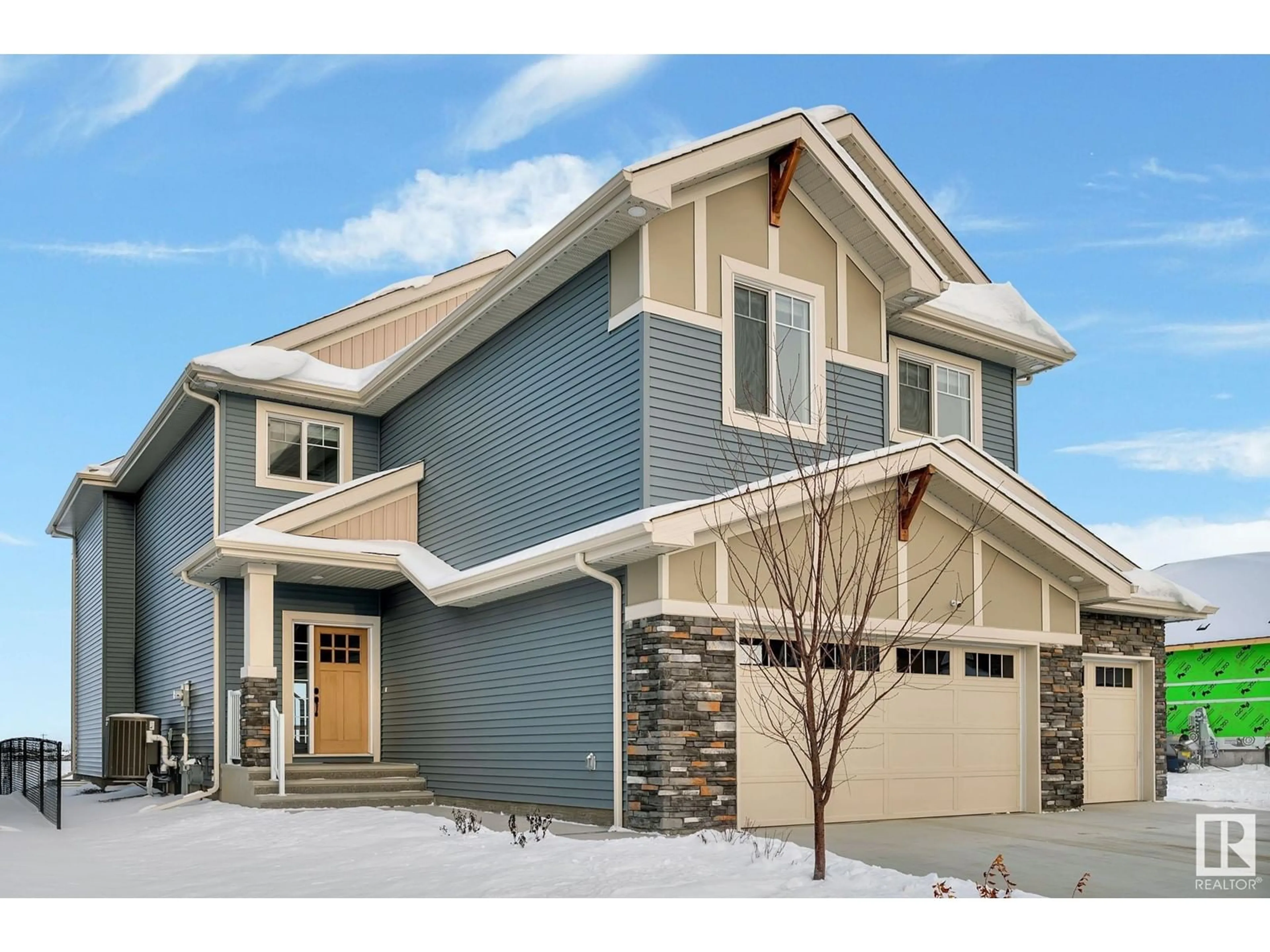 Home with vinyl exterior material, street for 2012 GENESIS LN, Stony Plain Alberta T7Z0K5