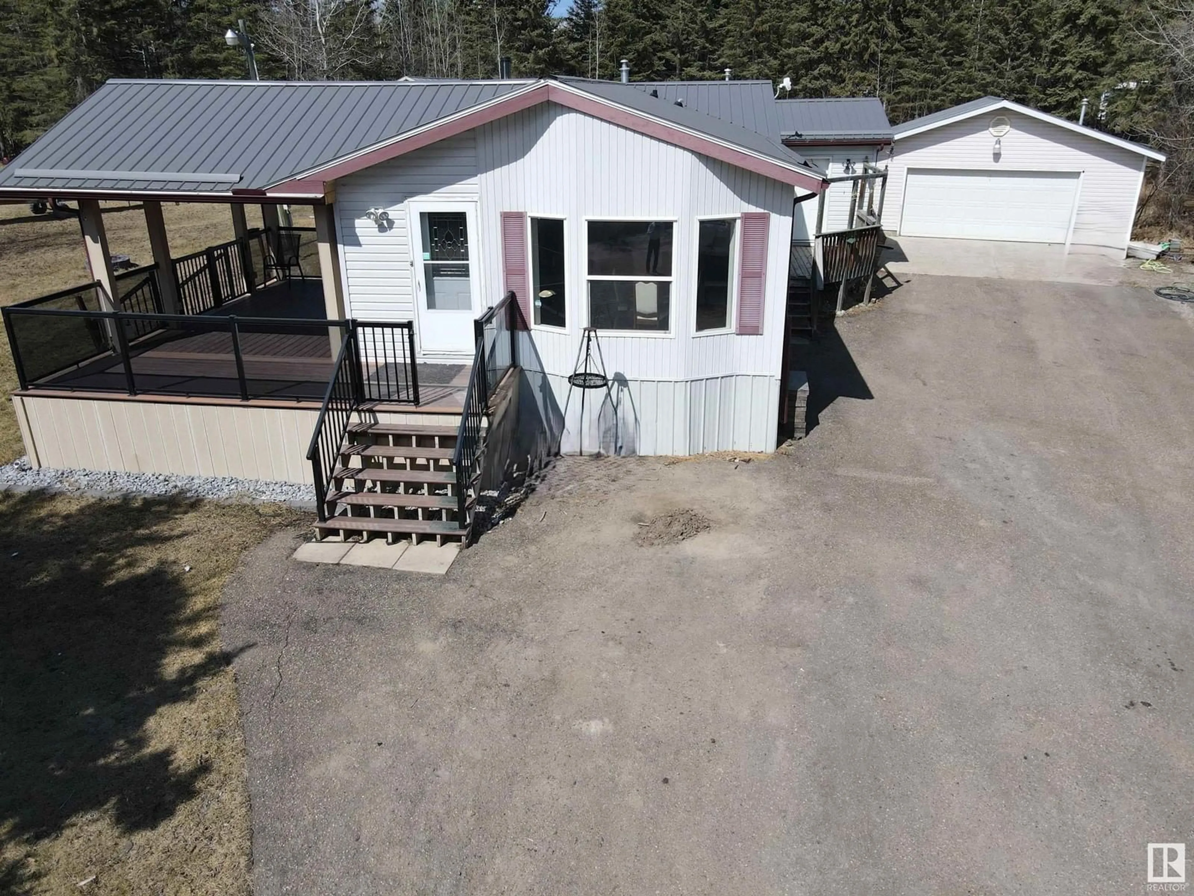 A pic from outside/outdoor area/front of a property/back of a property/a pic from drone, unknown for 104 63532 Rge Rd 444, Rural Bonnyville M.D. Alberta T0A1H0