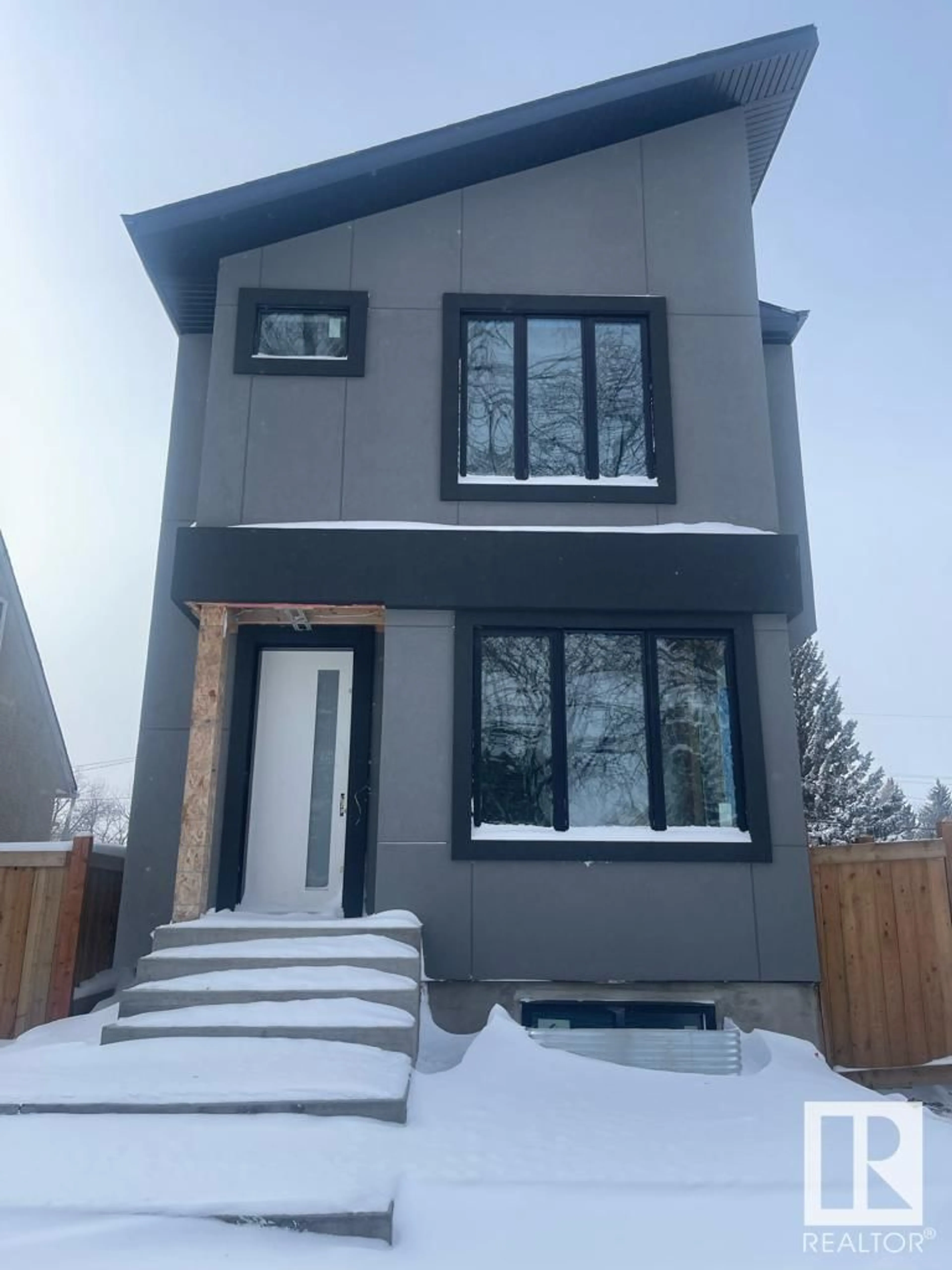 Home with vinyl exterior material, street for 10954 135 ST NW, Edmonton Alberta T5M1K2