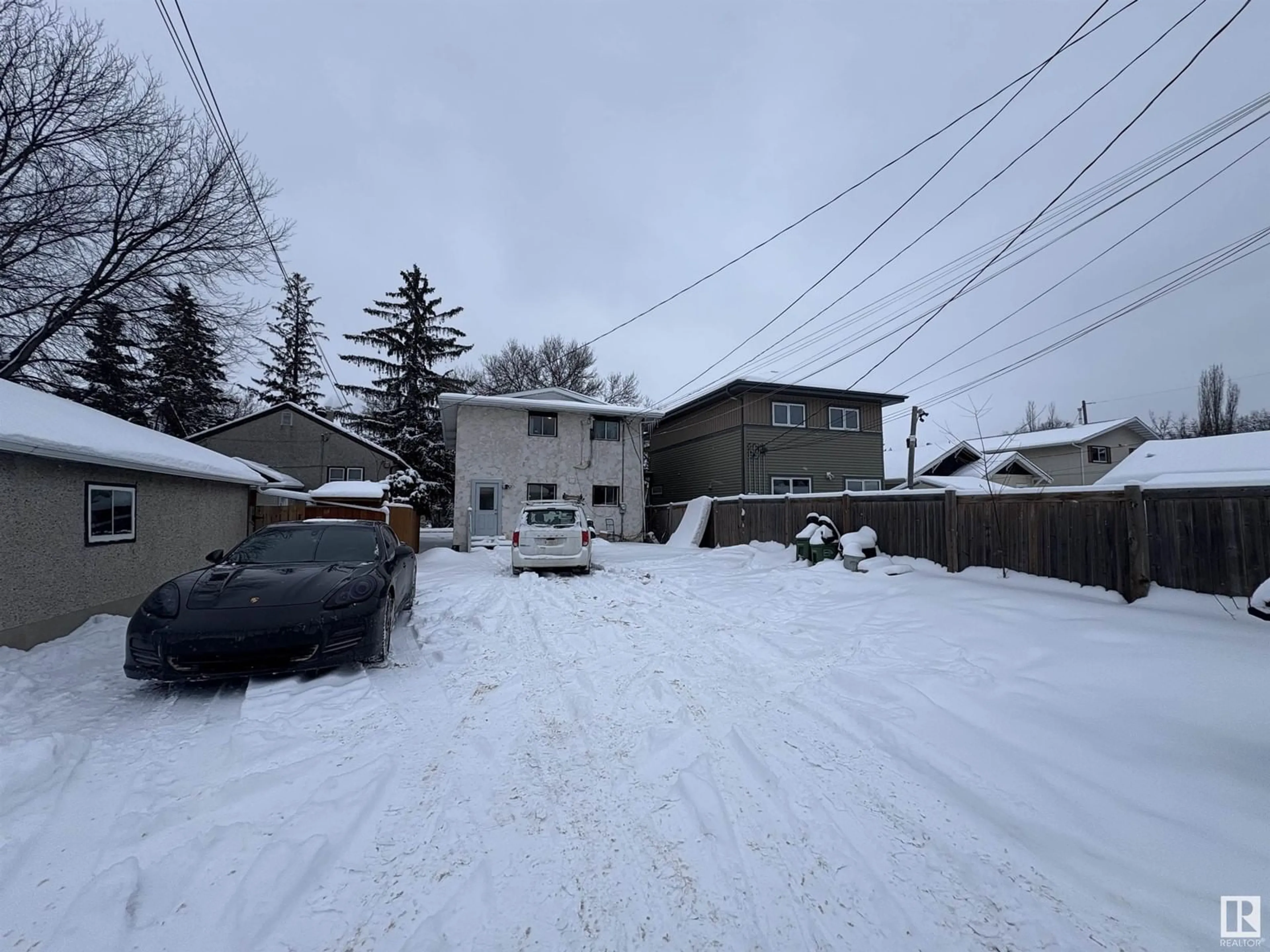 A pic from outside/outdoor area/front of a property/back of a property/a pic from drone, street for 10934 76 AV NW, Edmonton Alberta T6G0J7