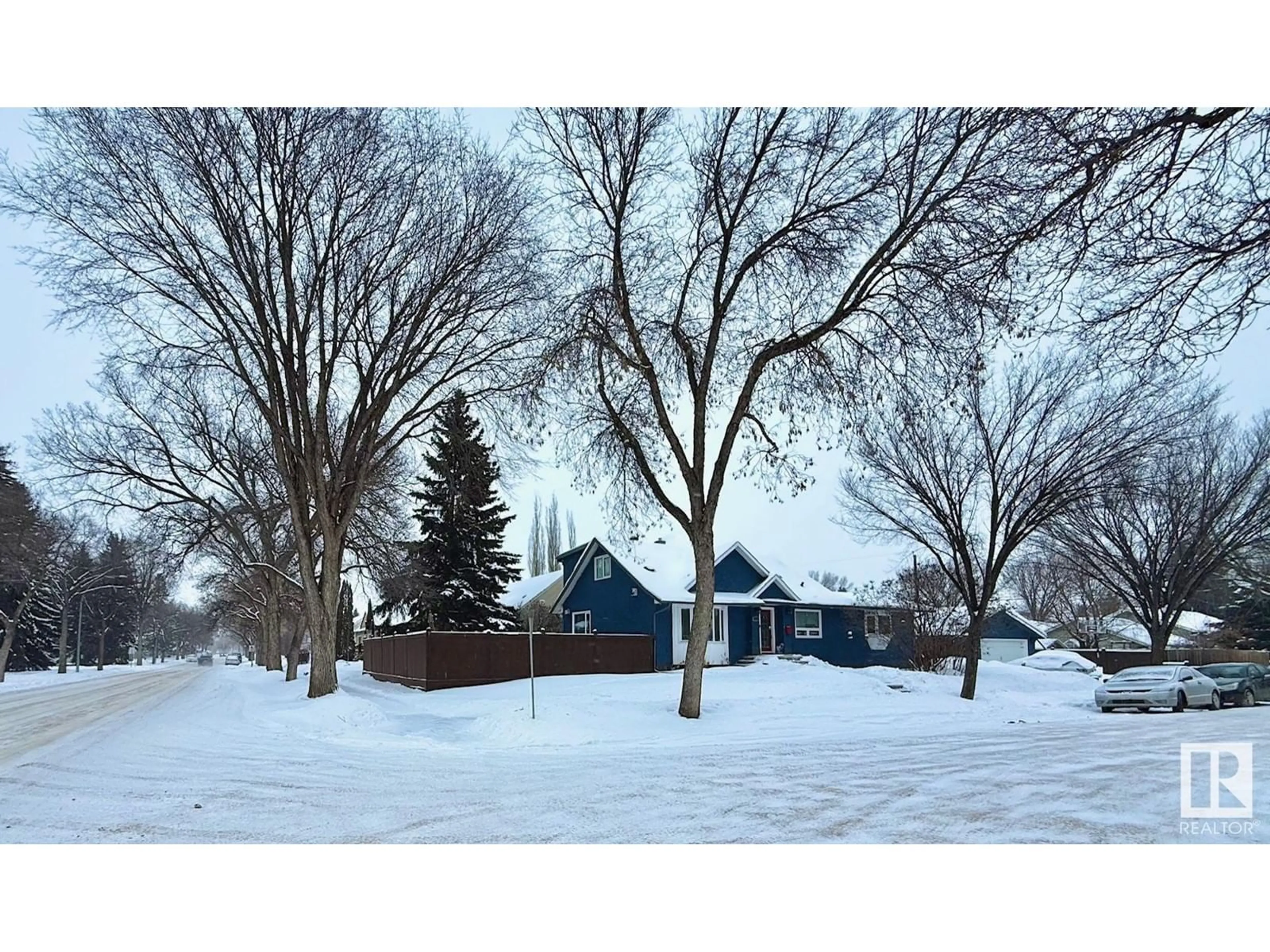 A pic from outside/outdoor area/front of a property/back of a property/a pic from drone, street for 12824 121 AV NW, Edmonton Alberta T5L2S7