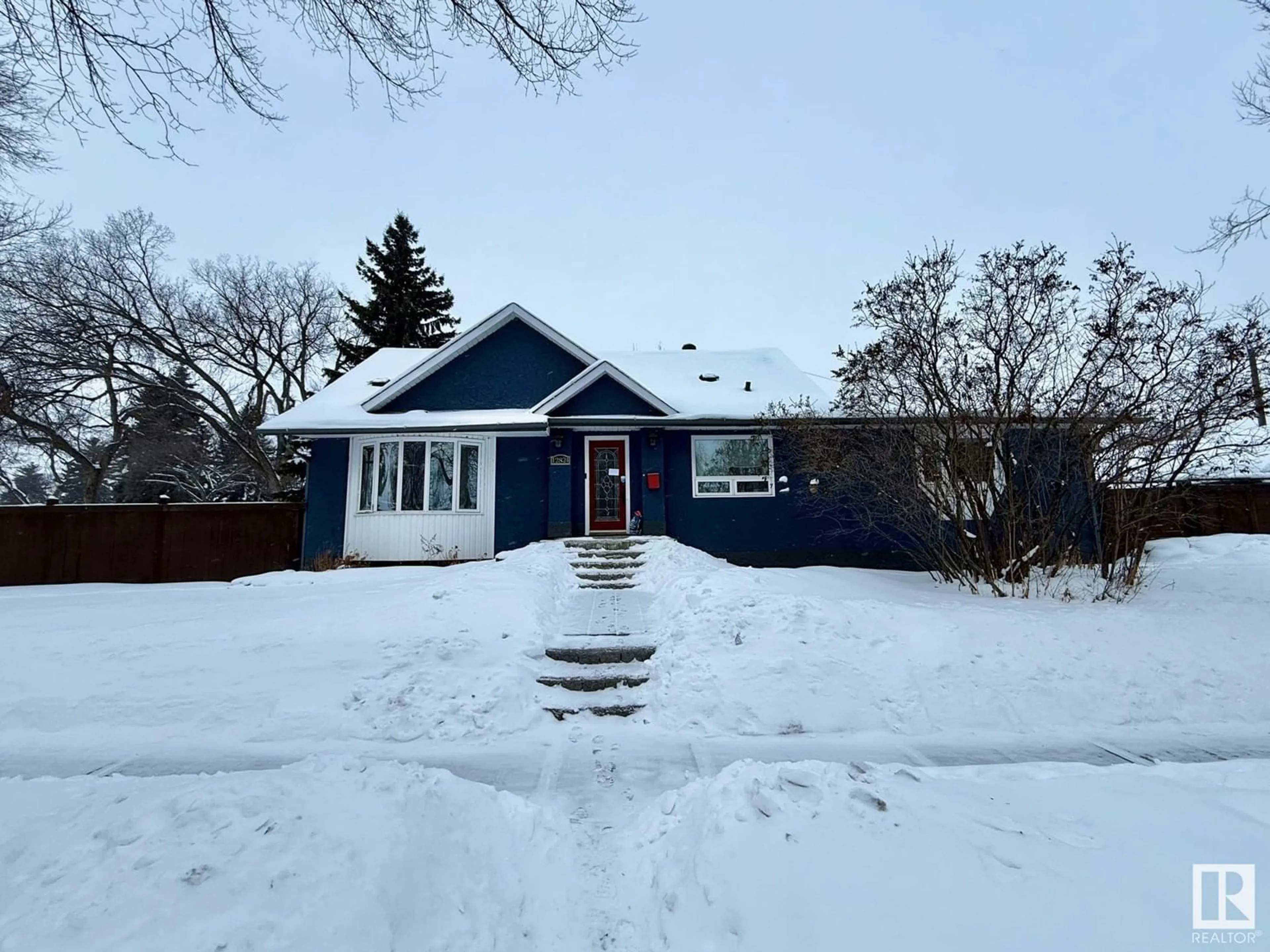 A pic from outside/outdoor area/front of a property/back of a property/a pic from drone, street for 12824 121 AV NW, Edmonton Alberta T5L2S7