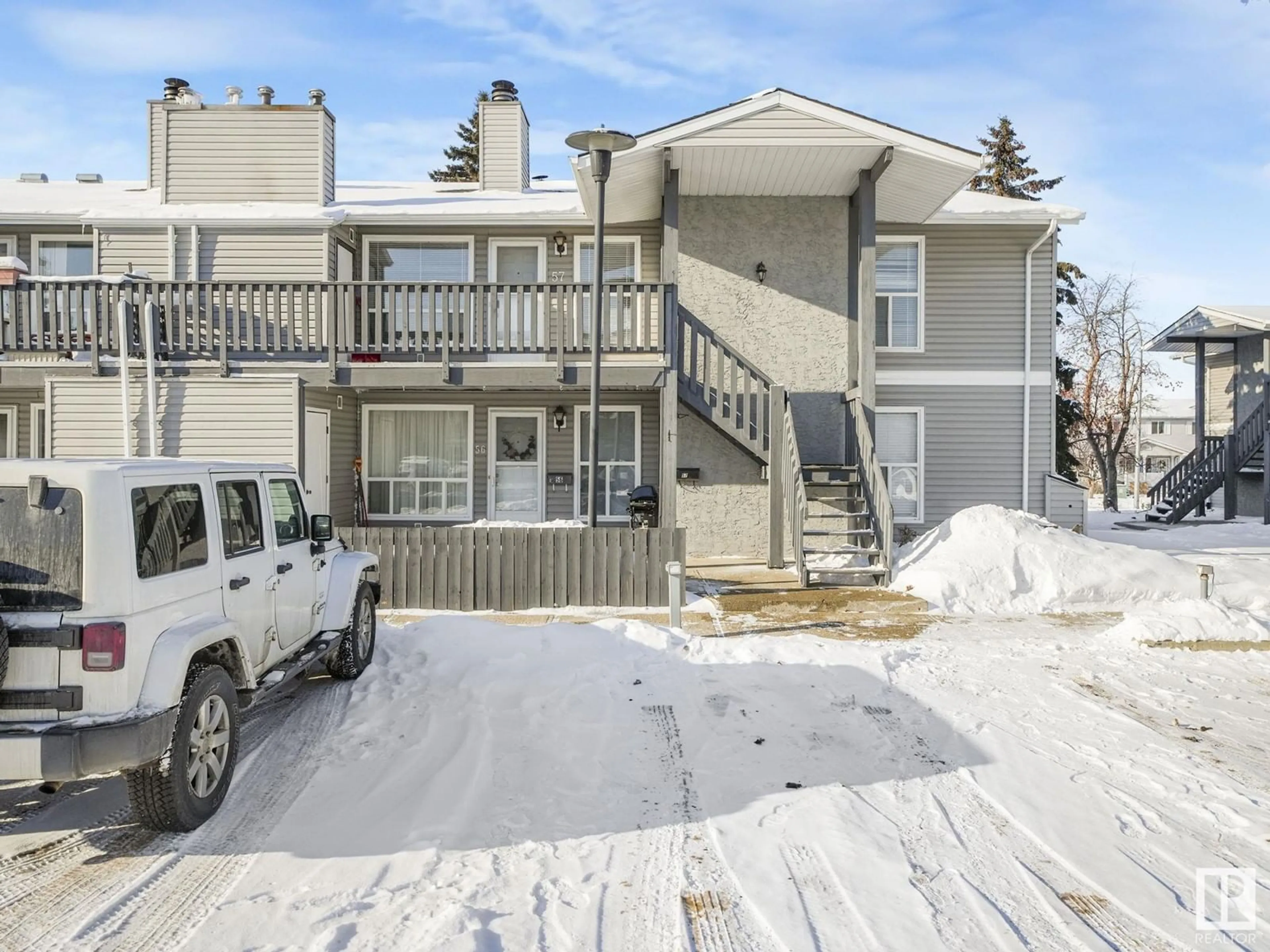 A pic from outside/outdoor area/front of a property/back of a property/a pic from drone, street for #57 1503 MILL WOODS RD E NW, Edmonton Alberta T6L4C2