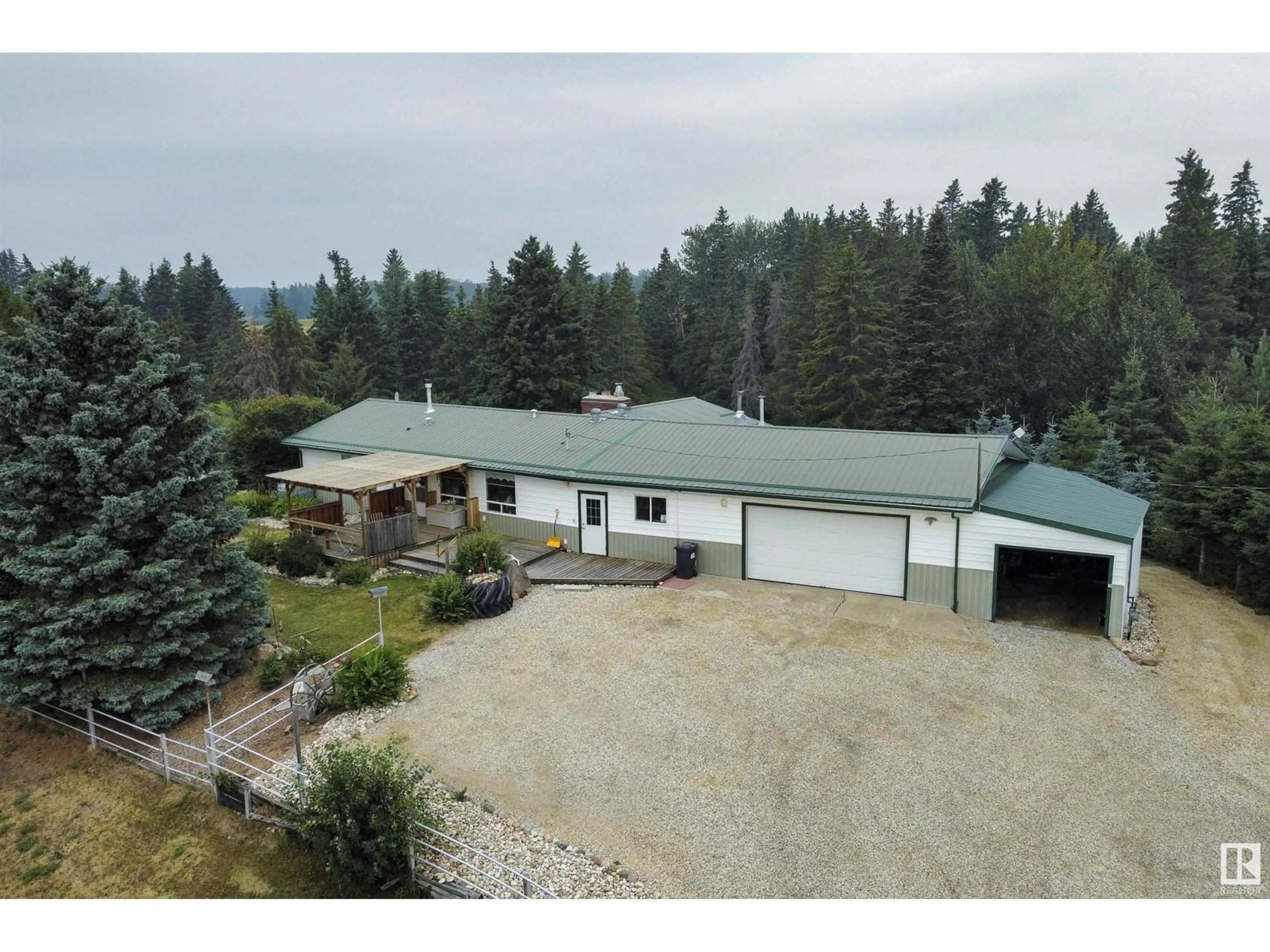 A pic from outside/outdoor area/front of a property/back of a property/a pic from drone, unknown for 53110 RGE RD 12, Rural Parkland County Alberta T7Y2T1