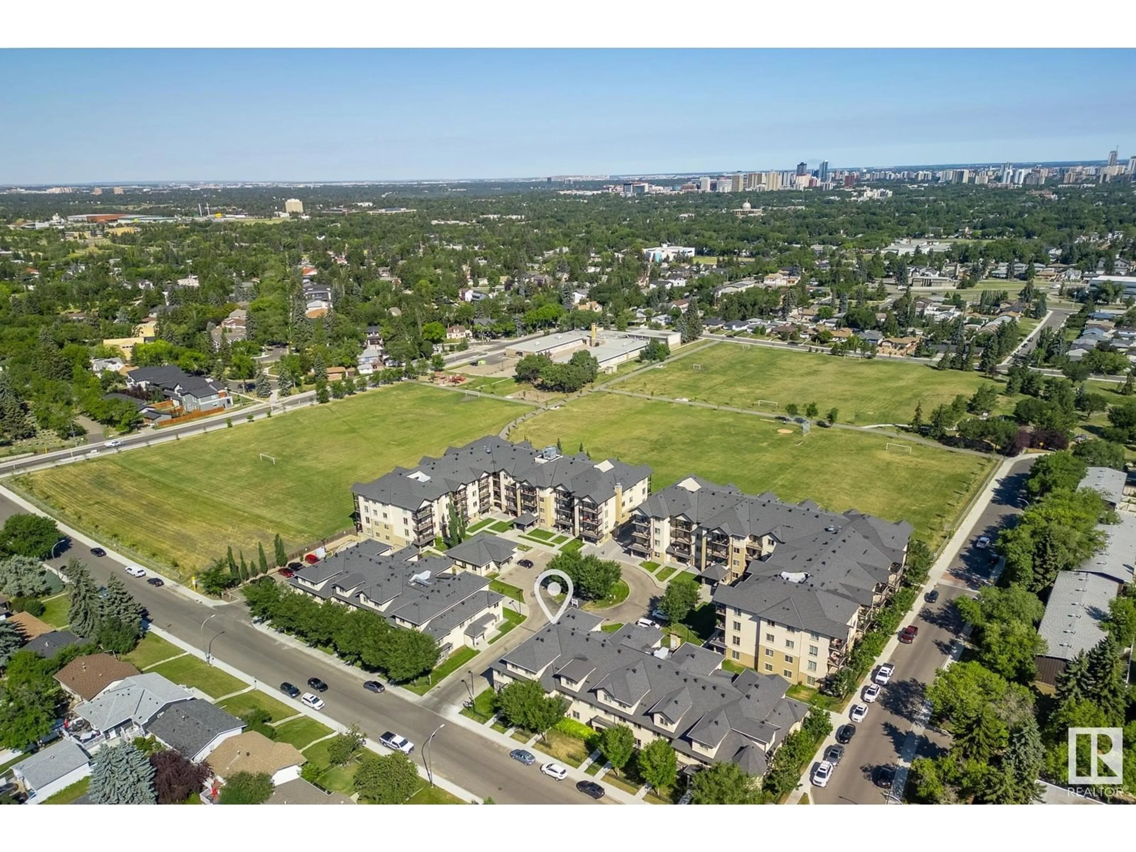 A pic from outside/outdoor area/front of a property/back of a property/a pic from drone, unknown for #108 10510 56 Ave NW NW, Edmonton Alberta T6H0X7